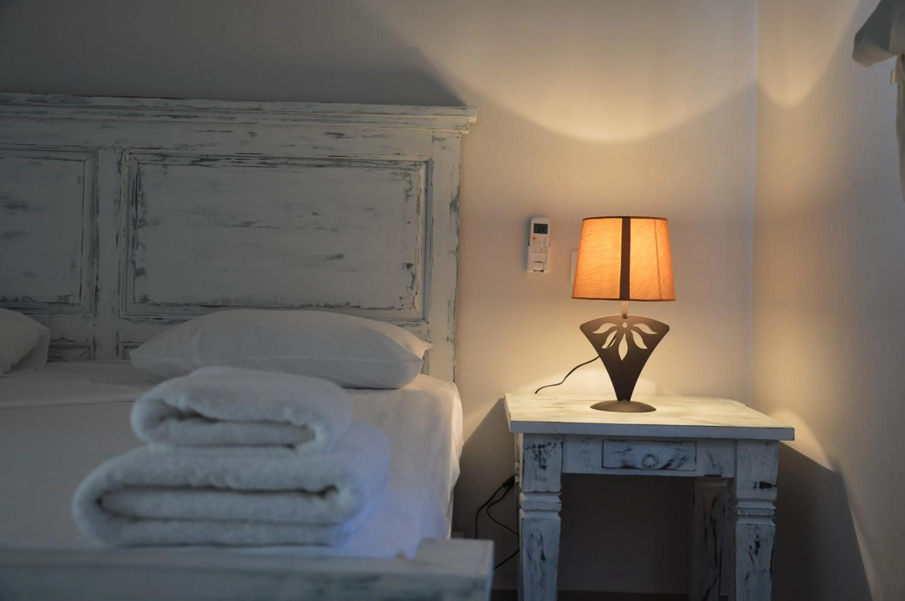 Bed in Ammos Luxury Suites