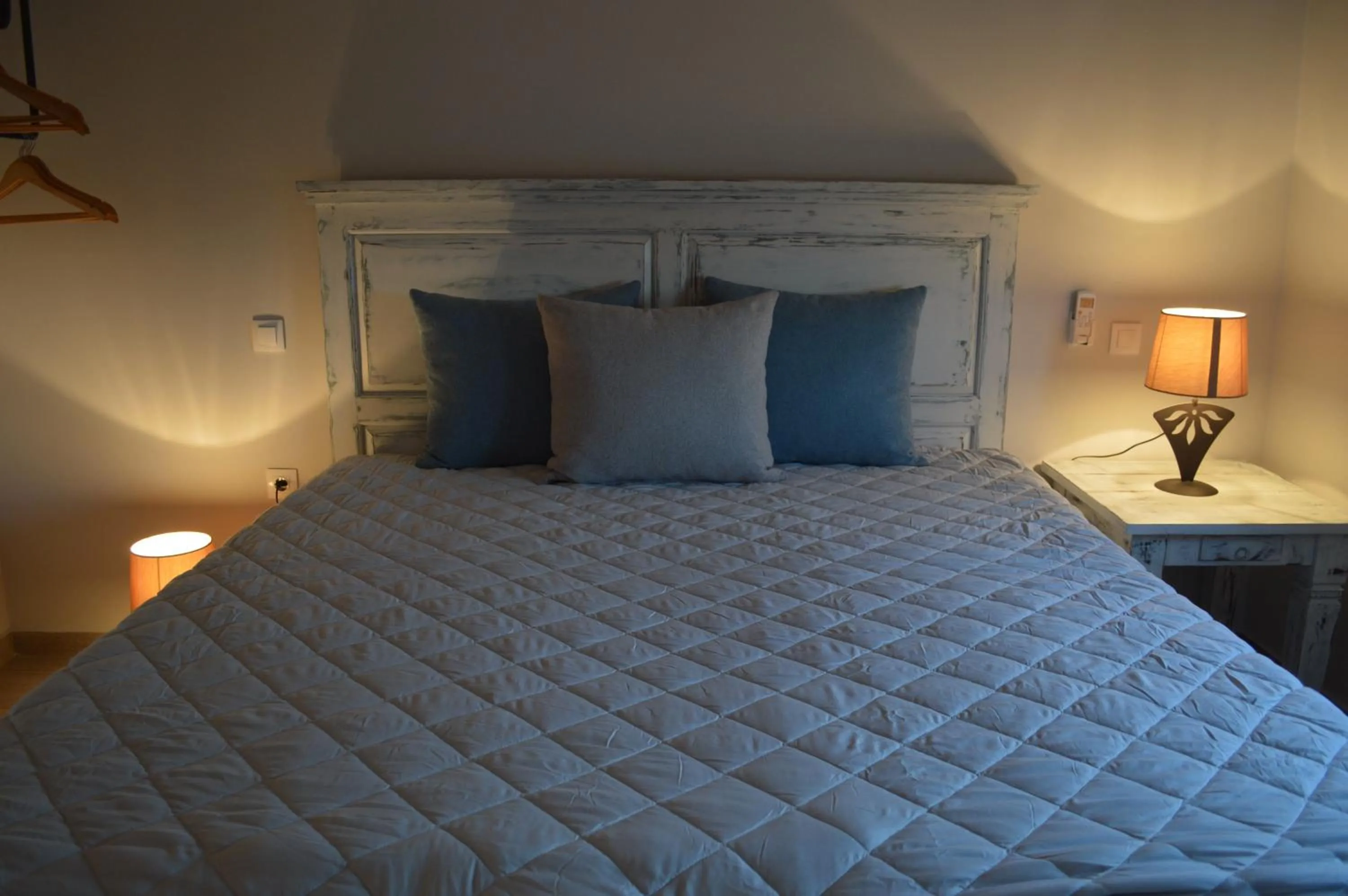 Bed in Ammos Luxury Suites