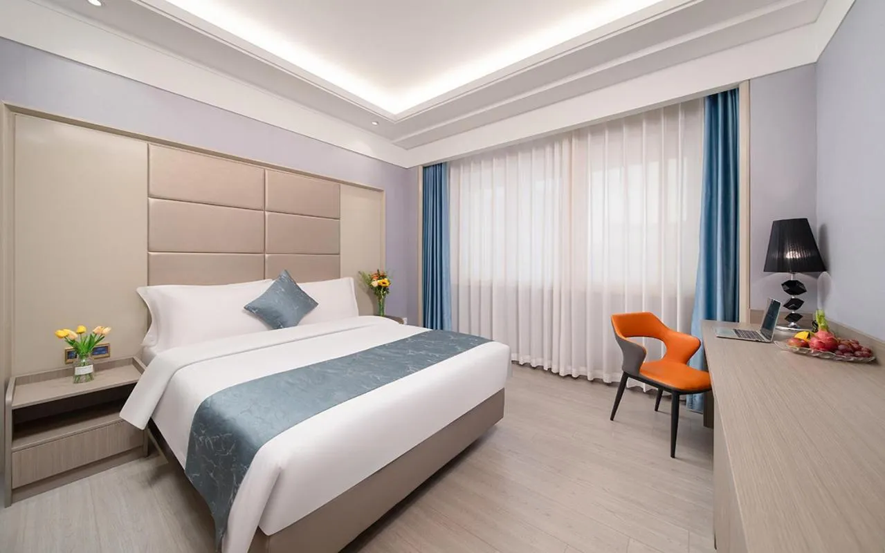 Bed in Ramada Shenzhen Baoan