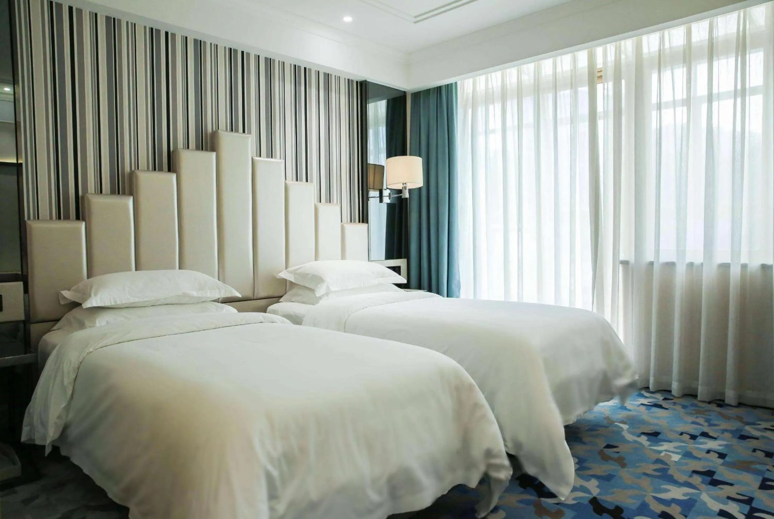 Photo of the whole room, Bed in Ramada Shenzhen Baoan