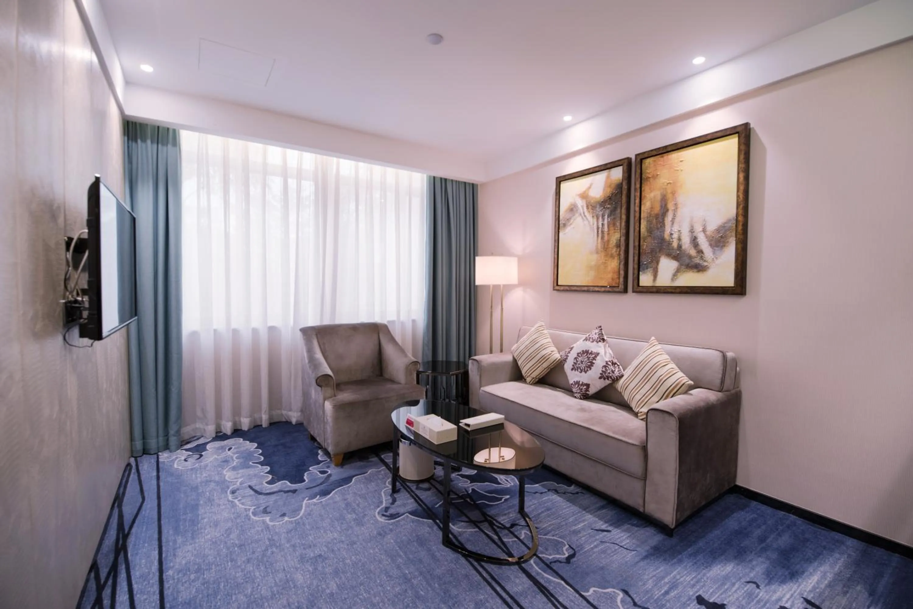 Living room in Ramada Shenzhen Baoan