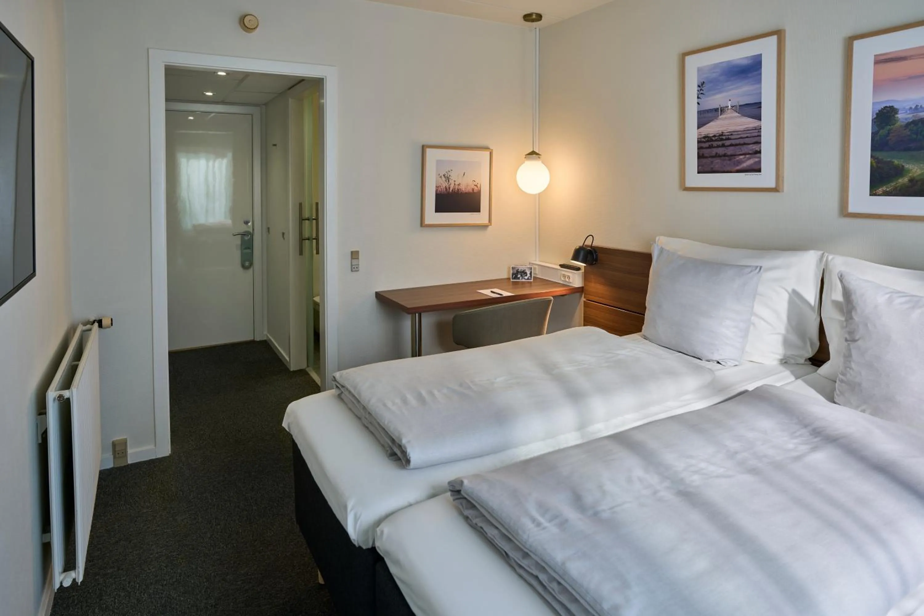 Bed in Hotel Faaborg Fjord