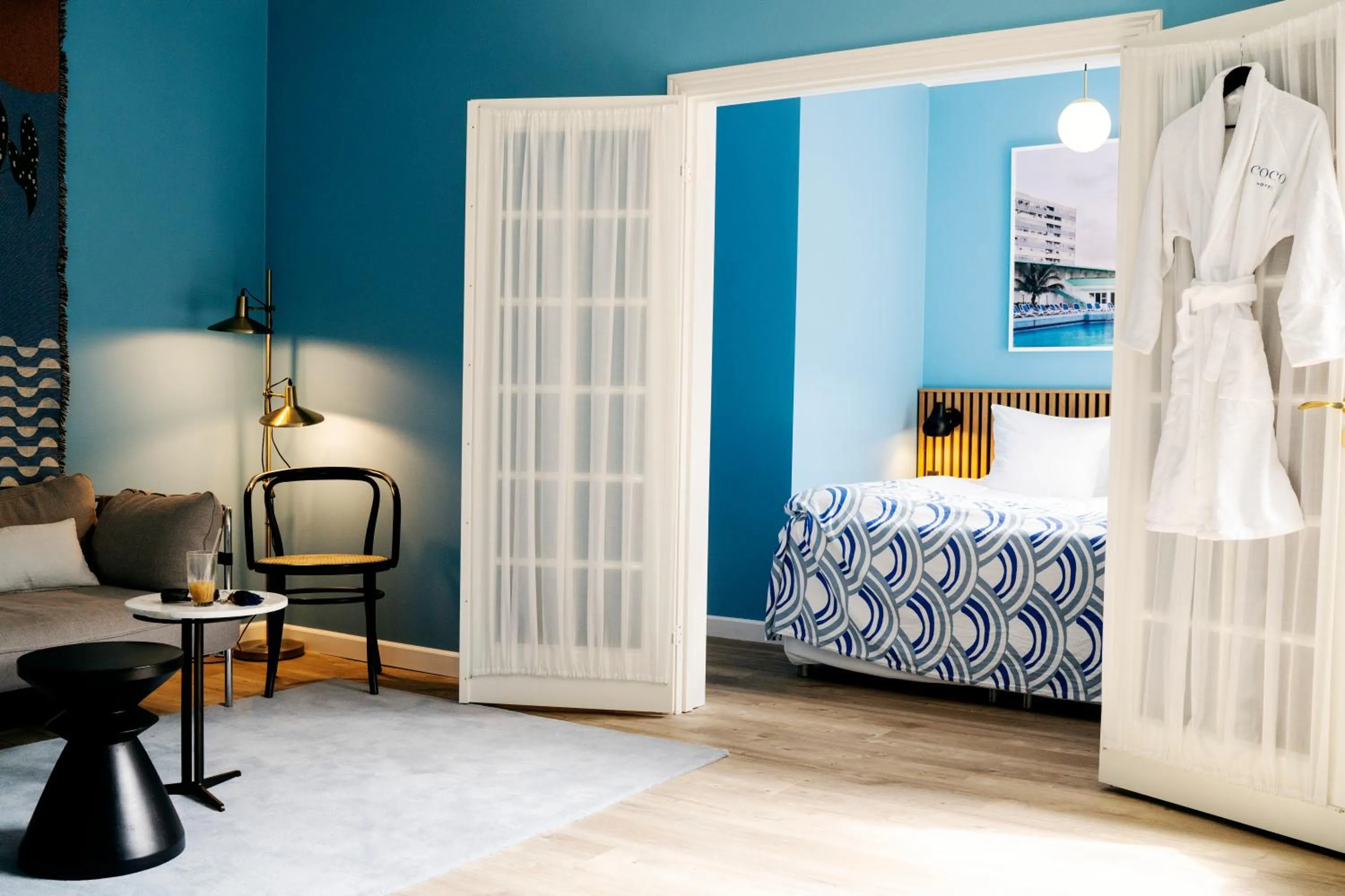 Living room, Bed in Coco Hotel