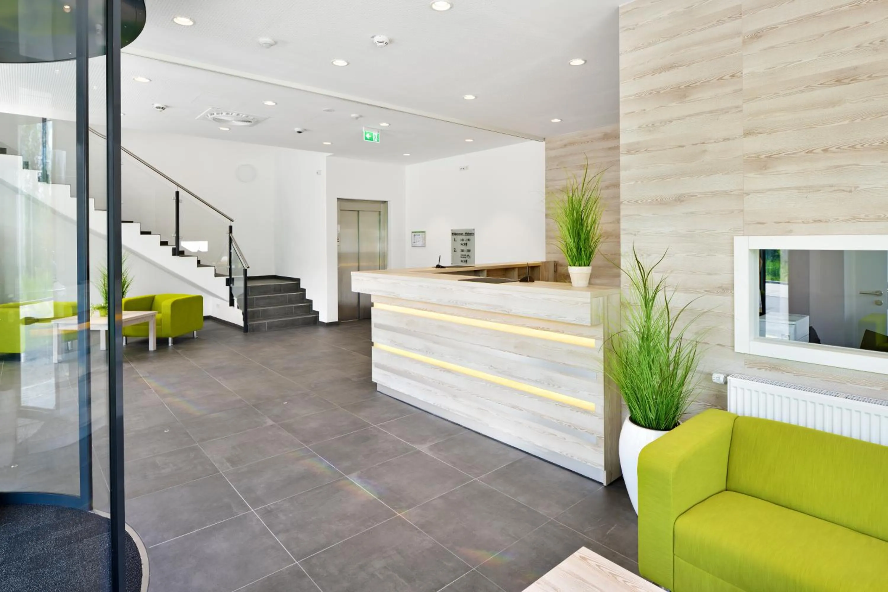 Lobby or reception in Novina Sleep Inn Herzogenaurach