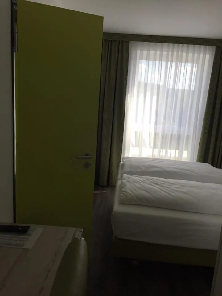 Photo of the whole room, Bed in Novina Sleep Inn Herzogenaurach