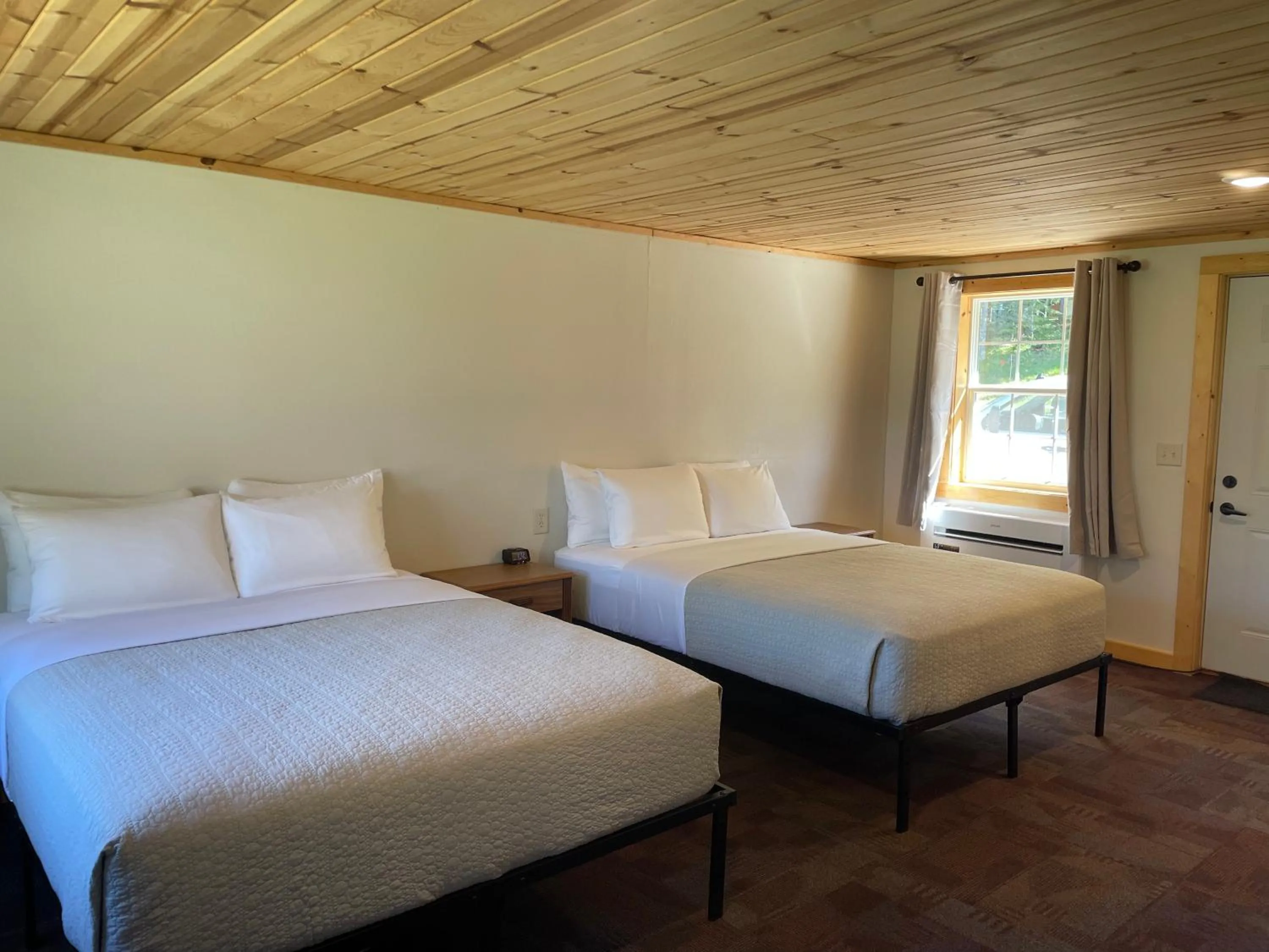 Bed in Hanging Horn Lakeside Resort