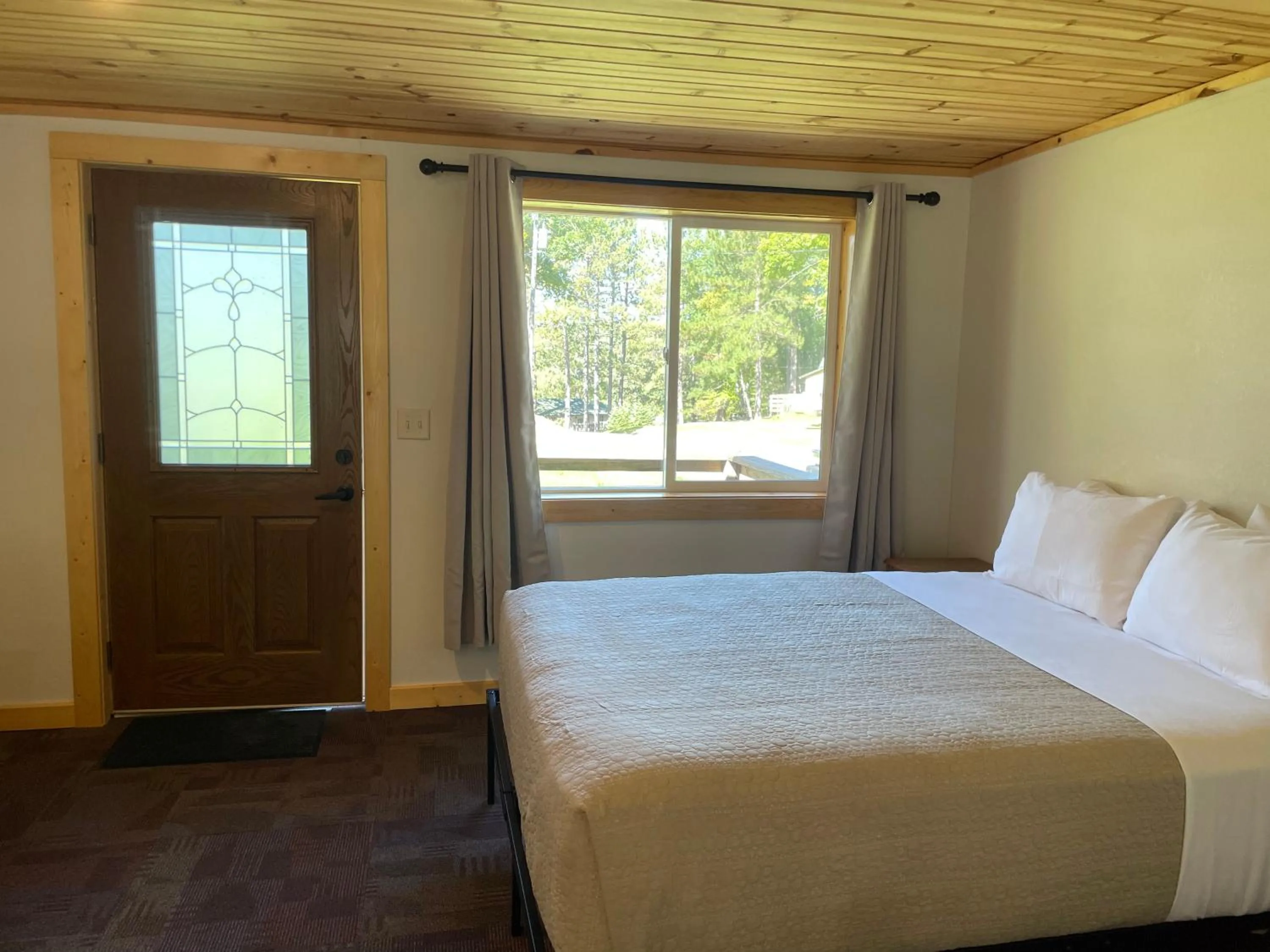 Bed in Hanging Horn Lakeside Resort