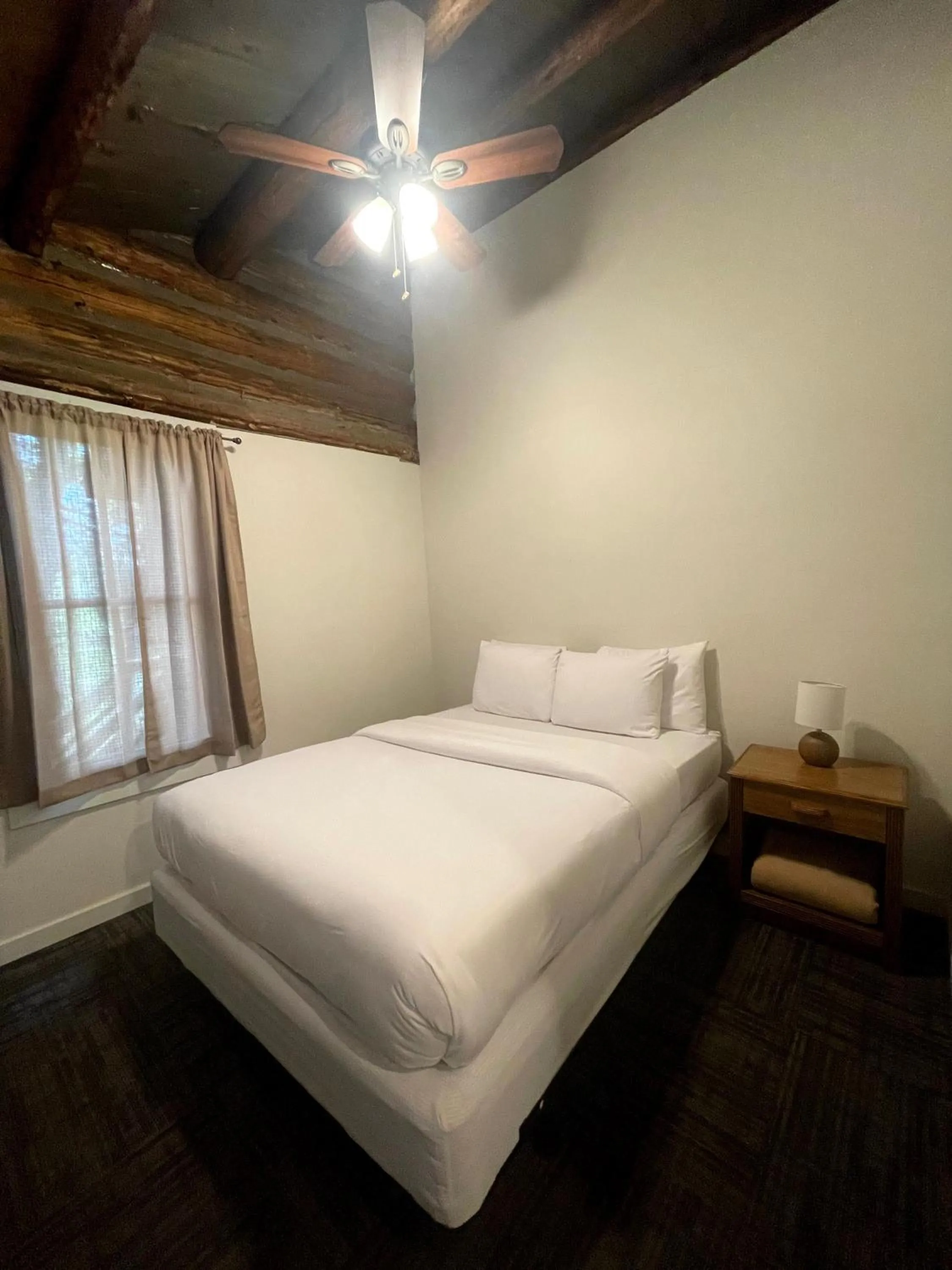 Bed in Hanging Horn Lakeside Resort