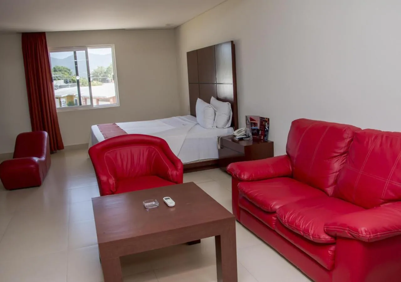 Bed in La Isla Auto Hotel