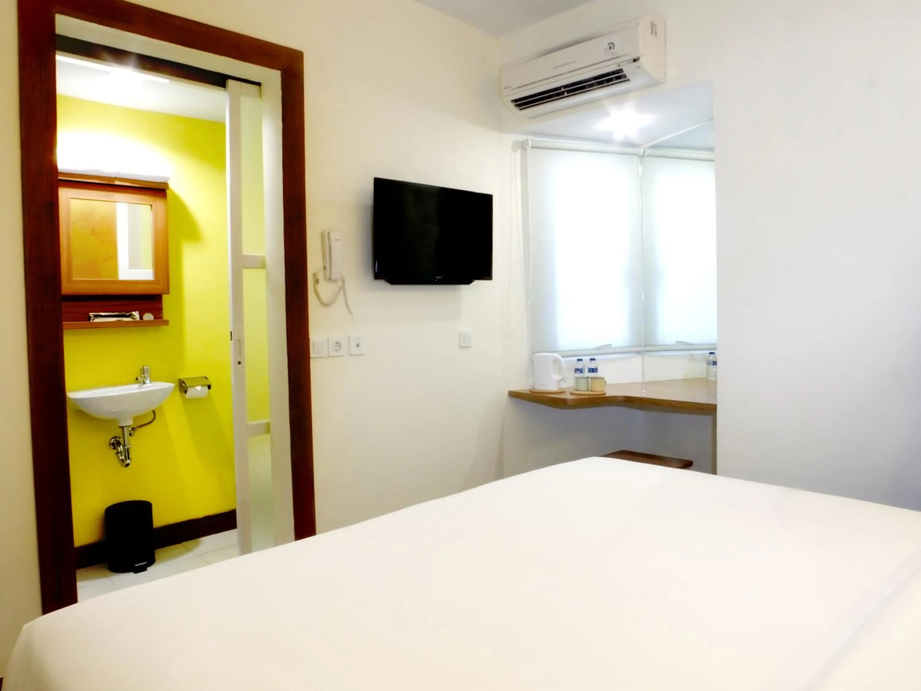 Bed in Nunia Inn Bandara Jakarta