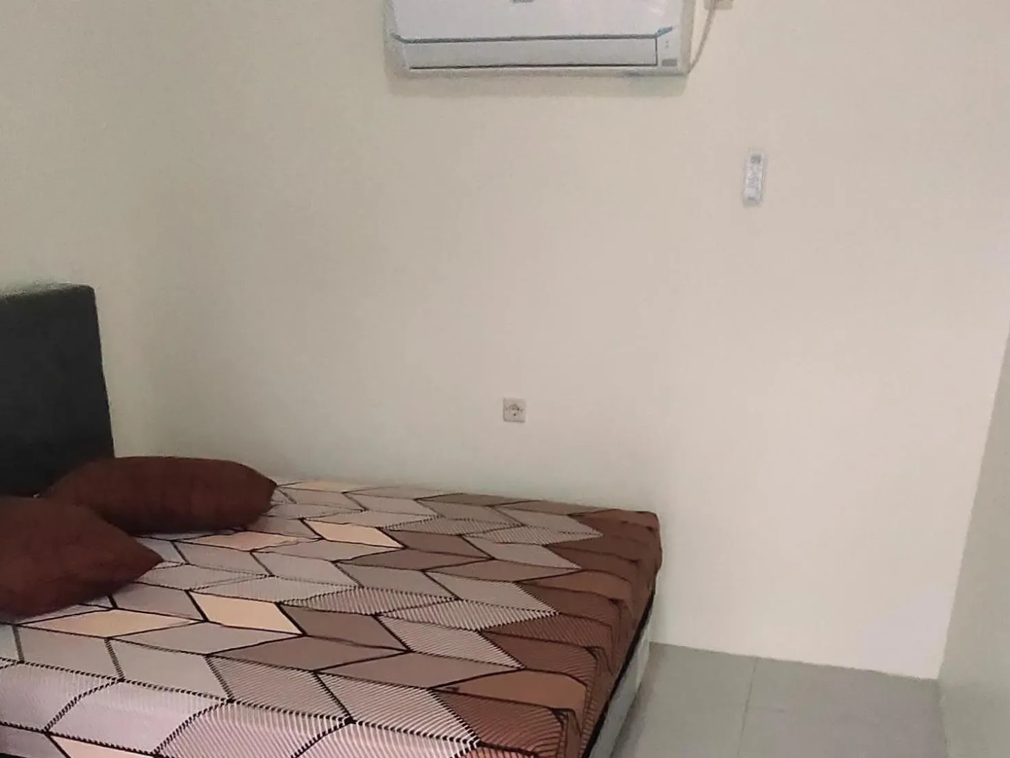Bed in Penginapan Karanglaut Sayangheulang