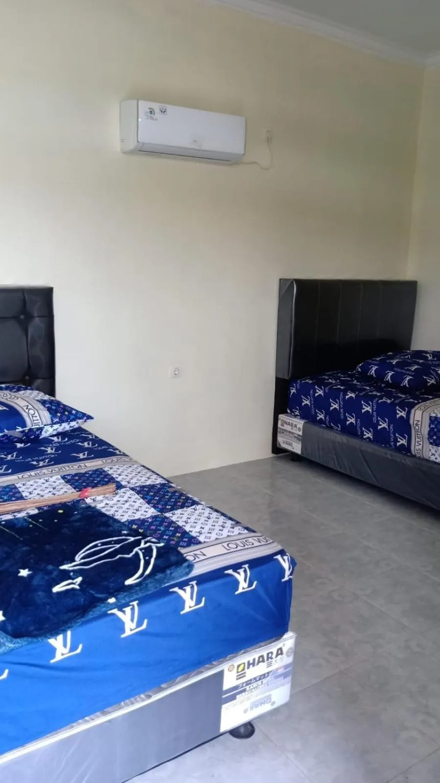 Bed in Penginapan Karanglaut Sayangheulang