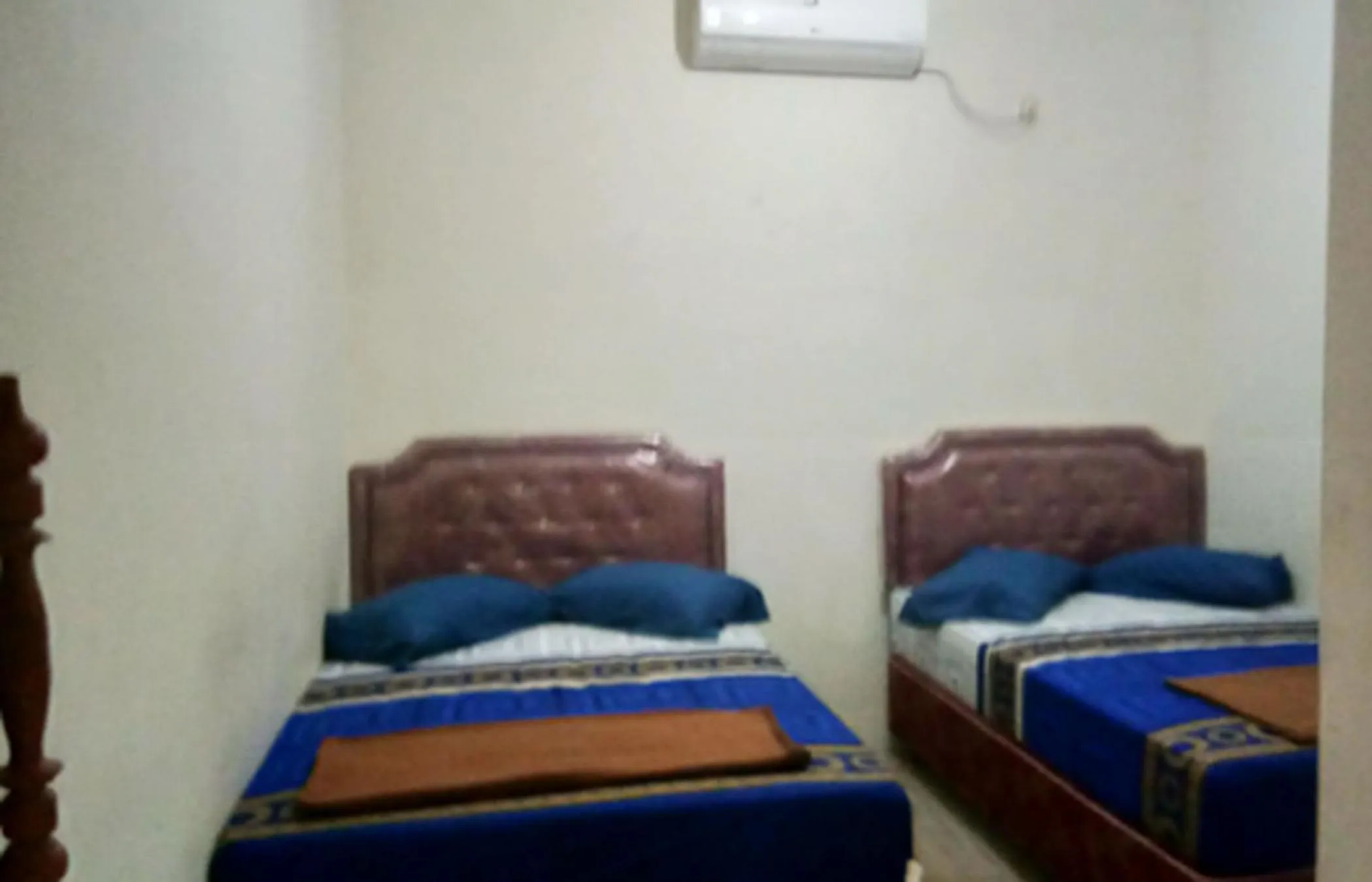 Bed in Penginapan Karanglaut Sayangheulang