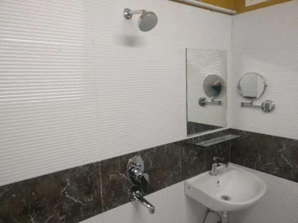 Bathroom in Hotel KK Residency