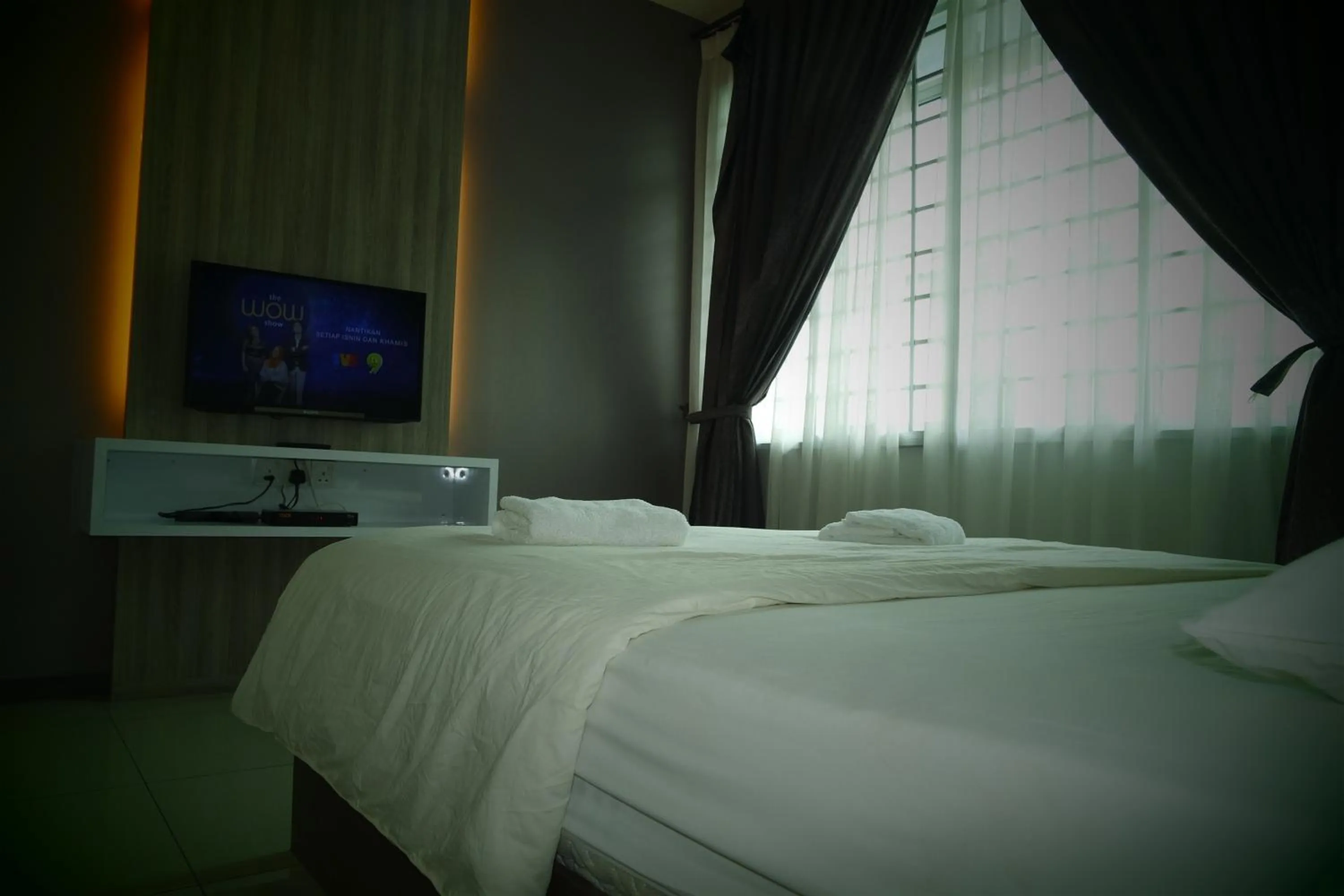 Bed in Lim Mini Hotel