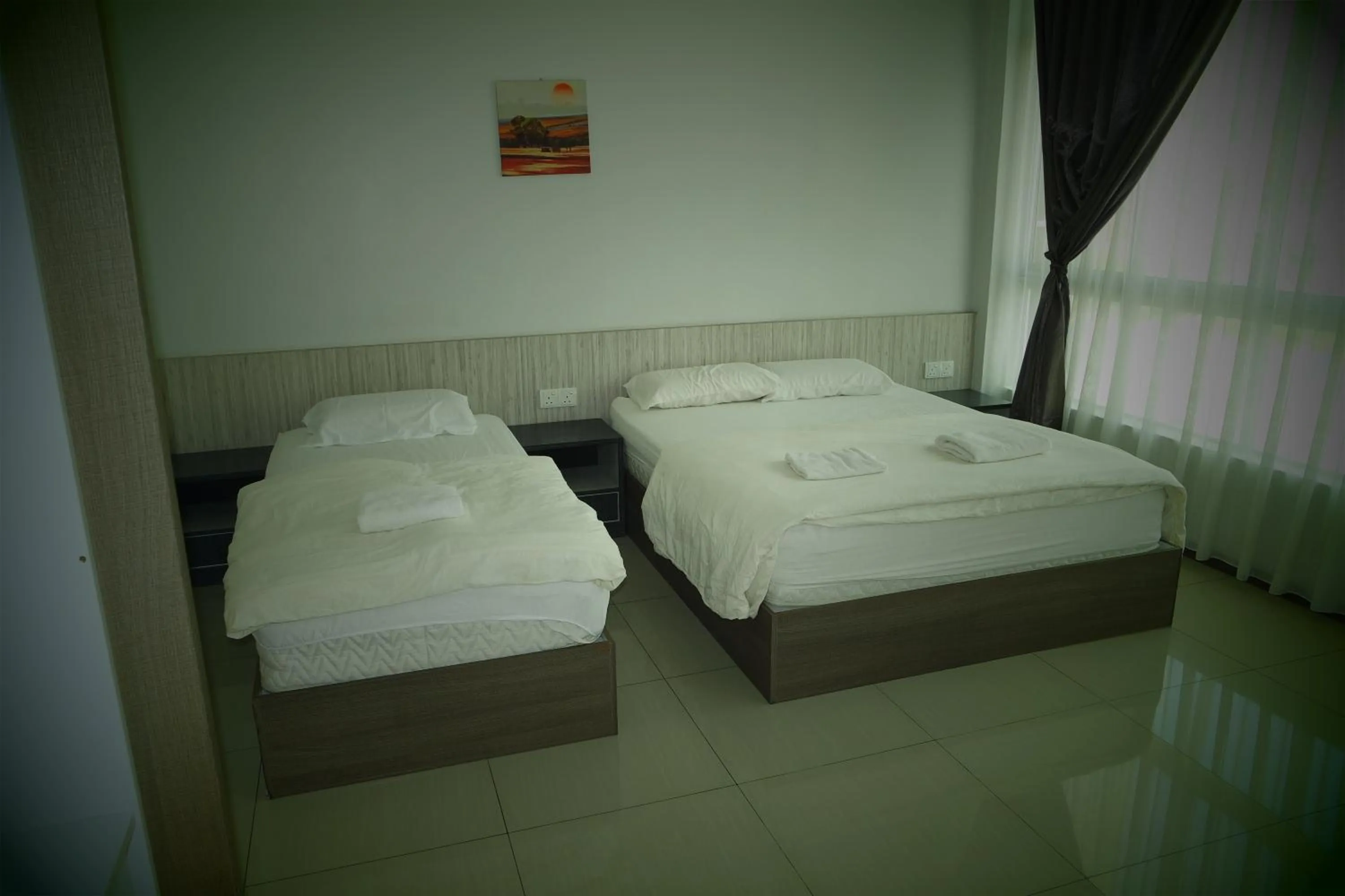 Bed in Lim Mini Hotel