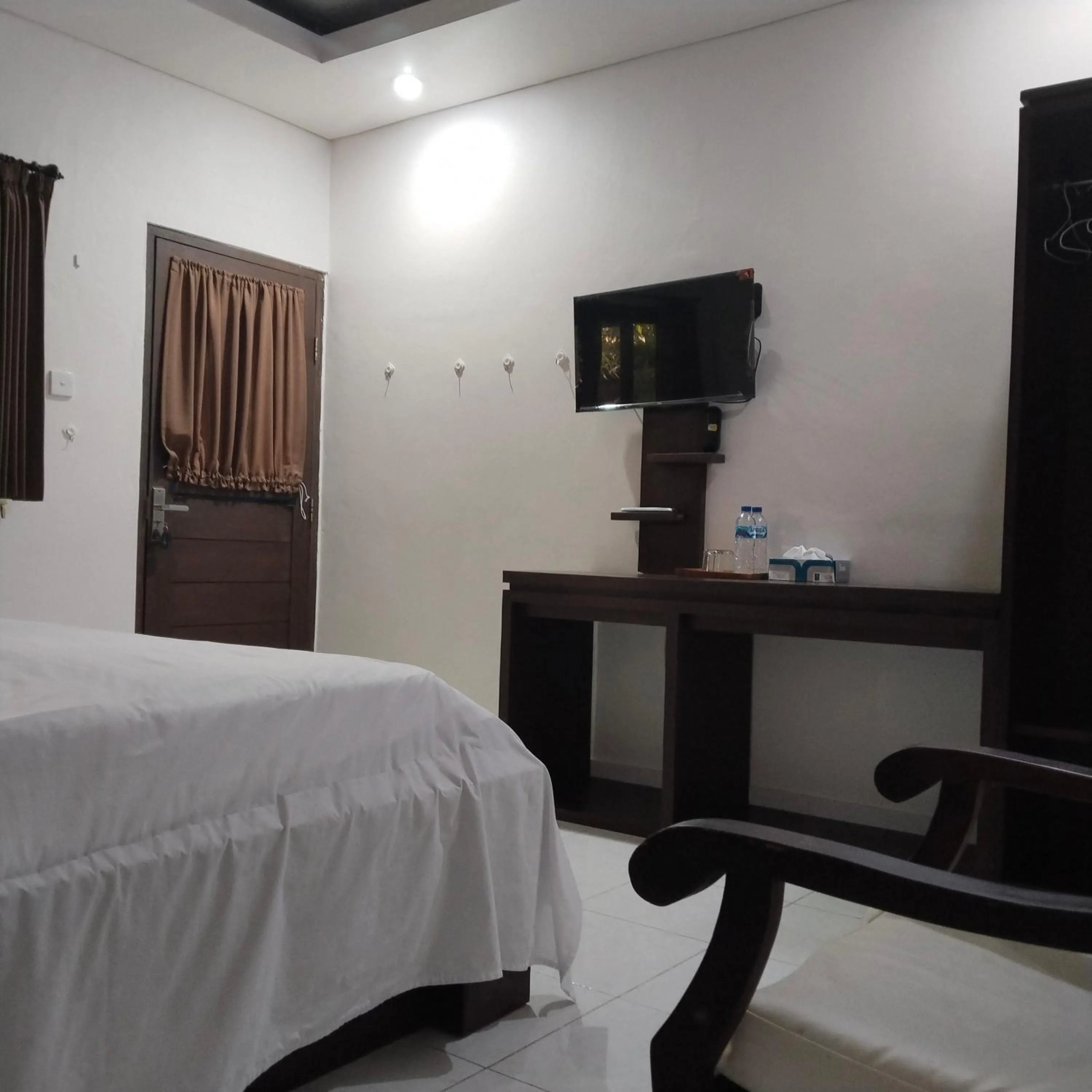 Bed in D'puja Home Stay and Spa