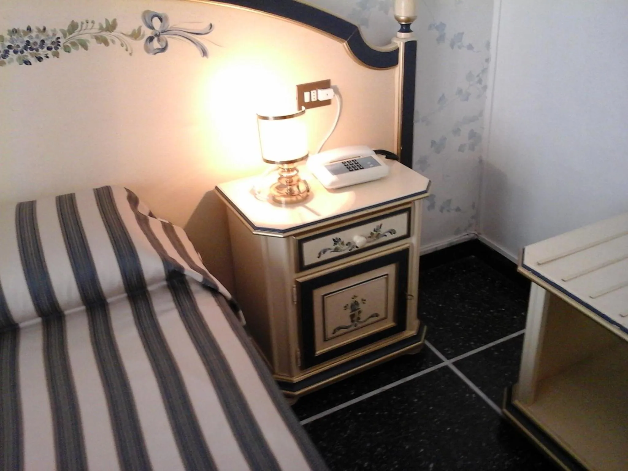 Decorative detail, Bed in Hotel Morchio Mhotelsgroup