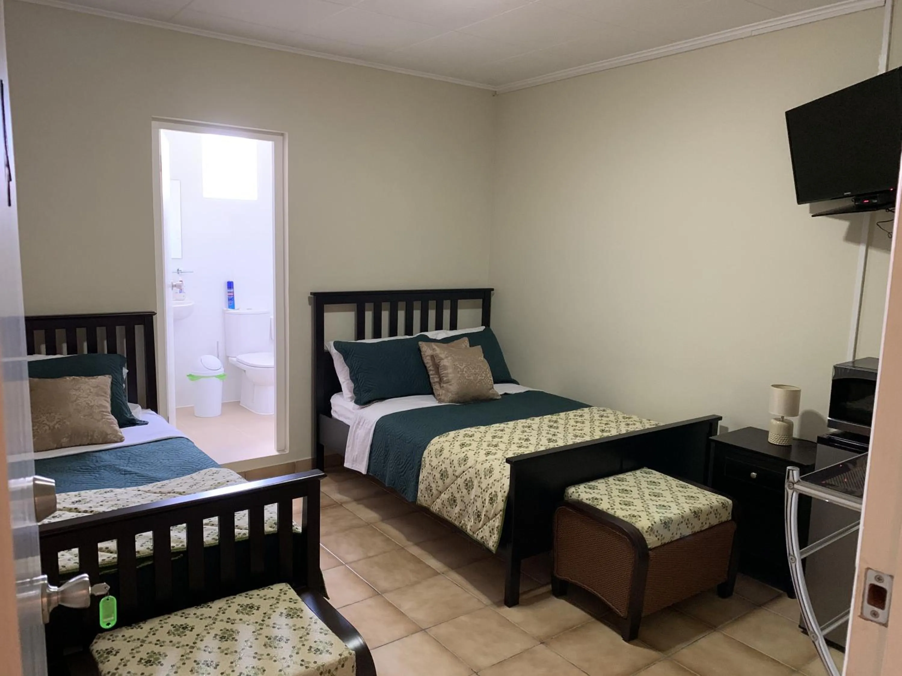 Photo of the whole room, Bed in Eve's Residence