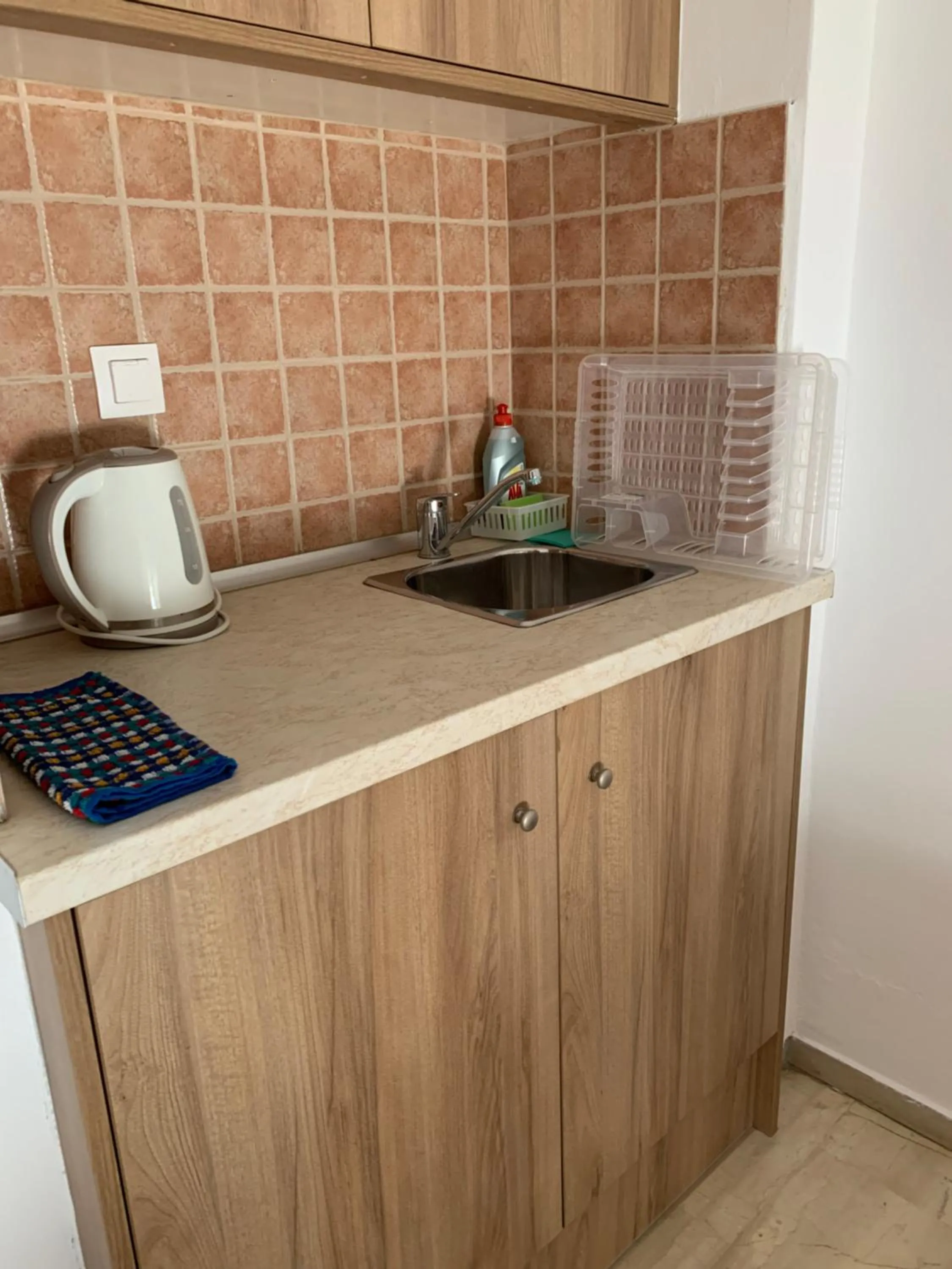 Kitchen or kitchenette in Sea View Studios, Harbour Beach, Bali