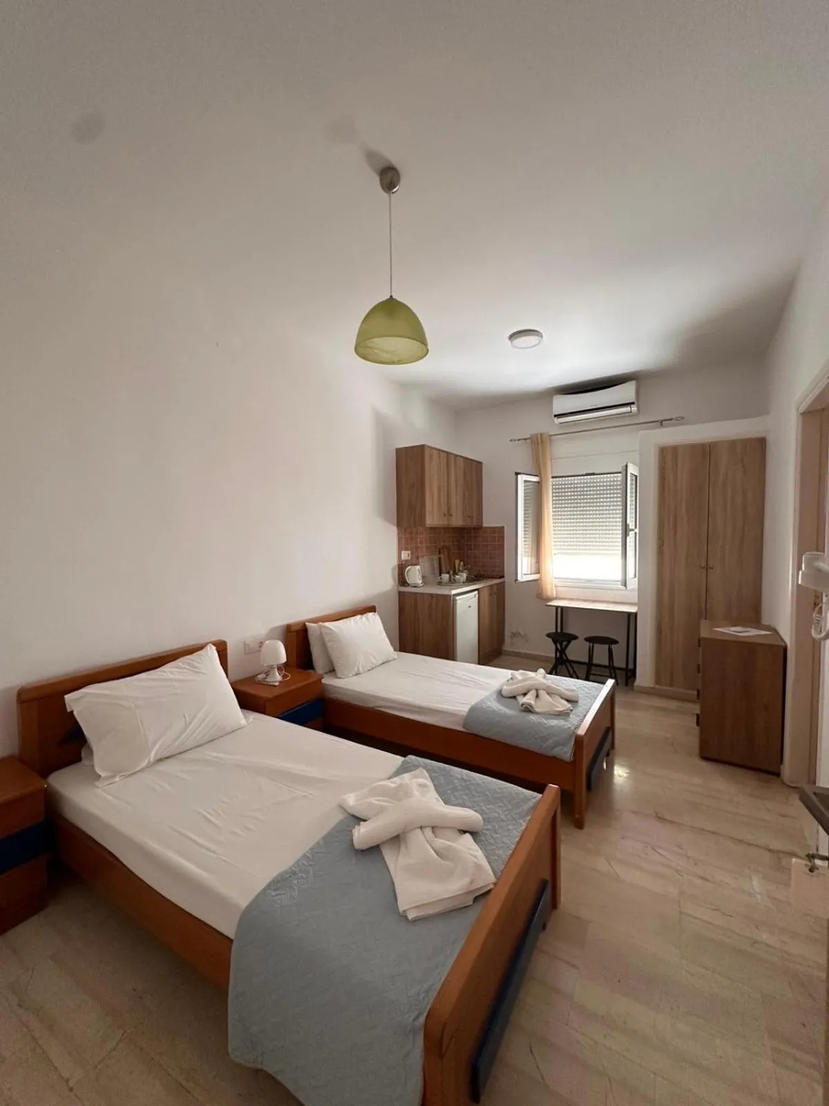 Bed in Sea View Studios, Harbour Beach, Bali