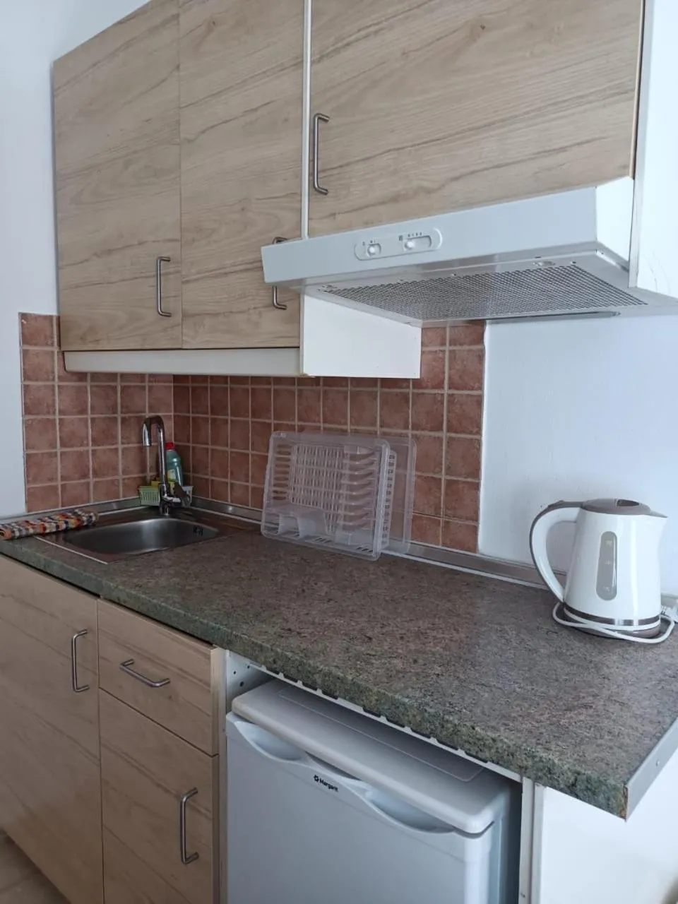 Kitchen or kitchenette in Sea View Studios, Harbour Beach, Bali