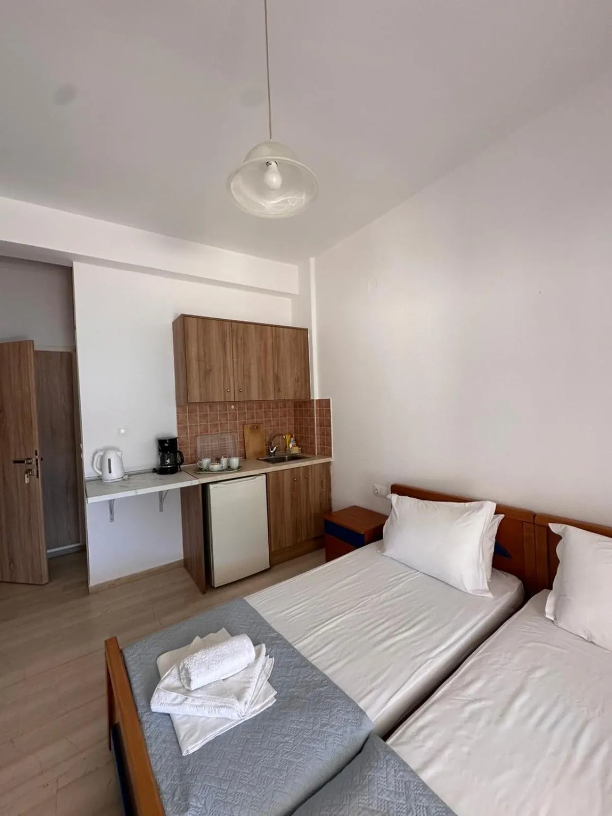 Bed in Sea View Studios, Harbour Beach, Bali