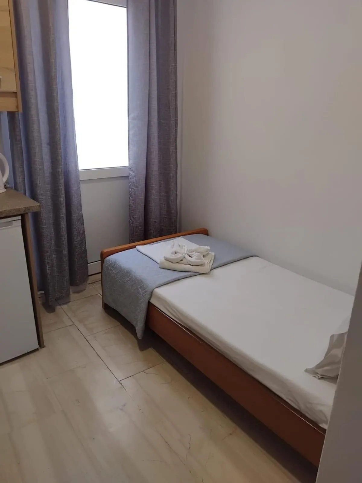 Bed in Sea View Studios, Harbour Beach, Bali