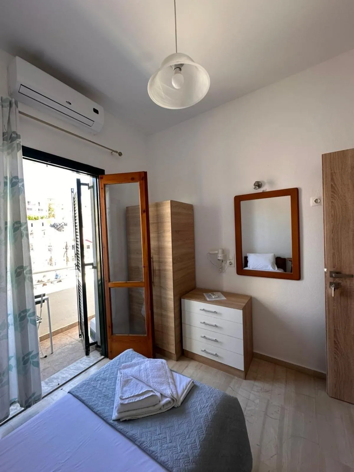 Bed in Sea View Studios, Harbour Beach, Bali