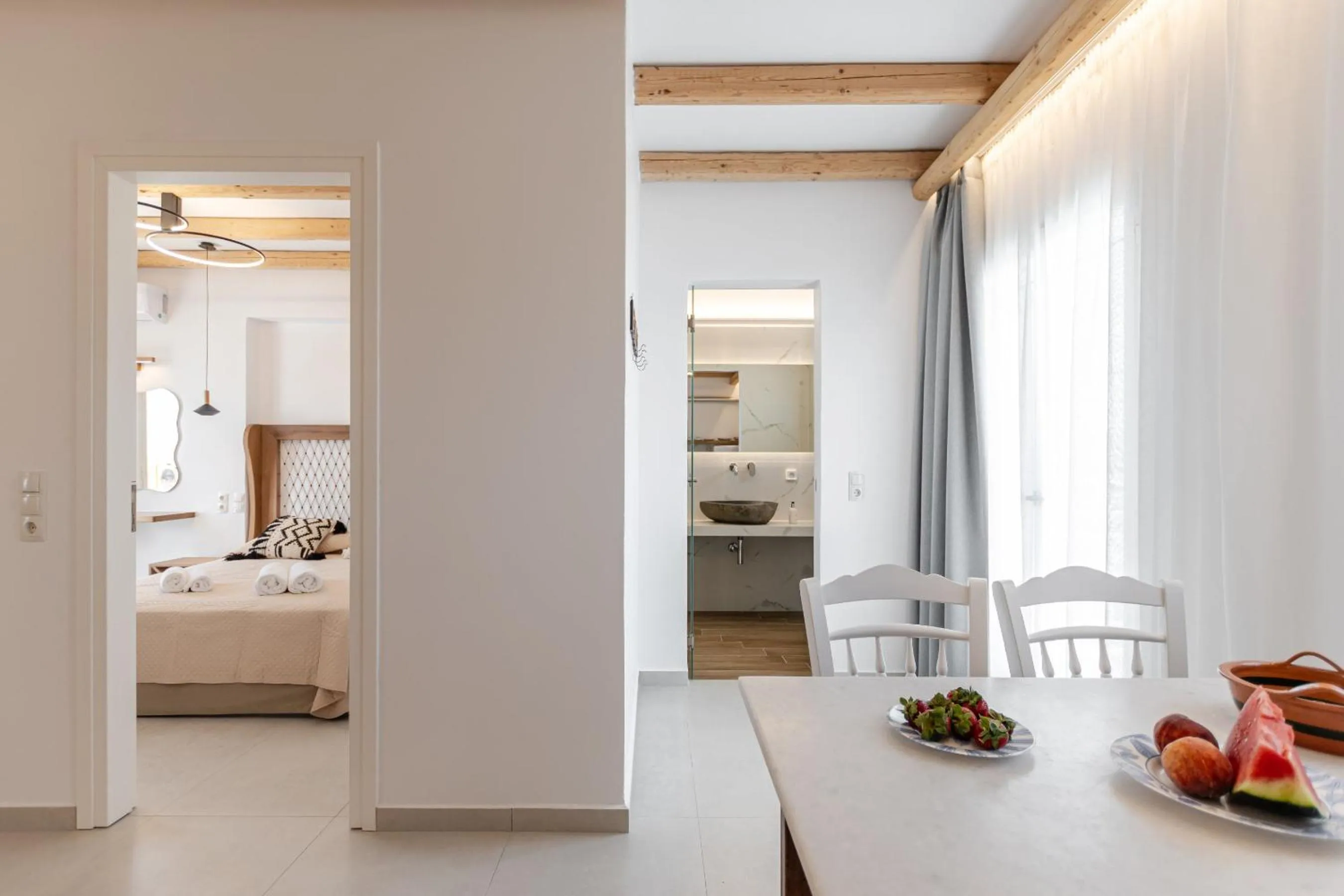 Bed in Birikos Hotel & Suites