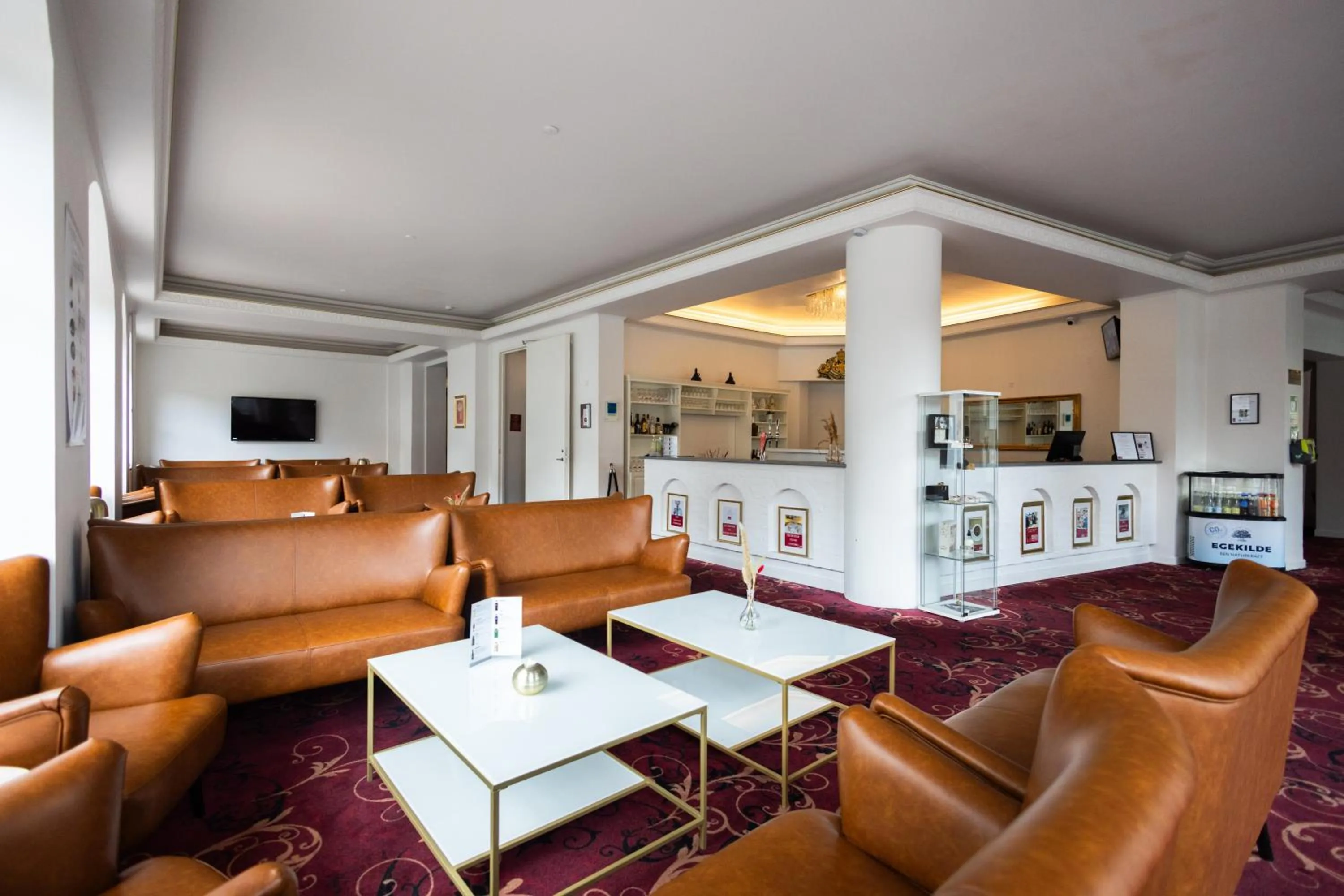 Communal lounge/ TV room in Milling Hotel Saxildhus