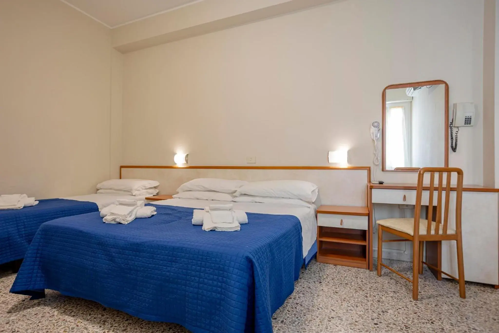 Bed in Hotel Stella Del Mare Bed in Hotel Stella Del Mare