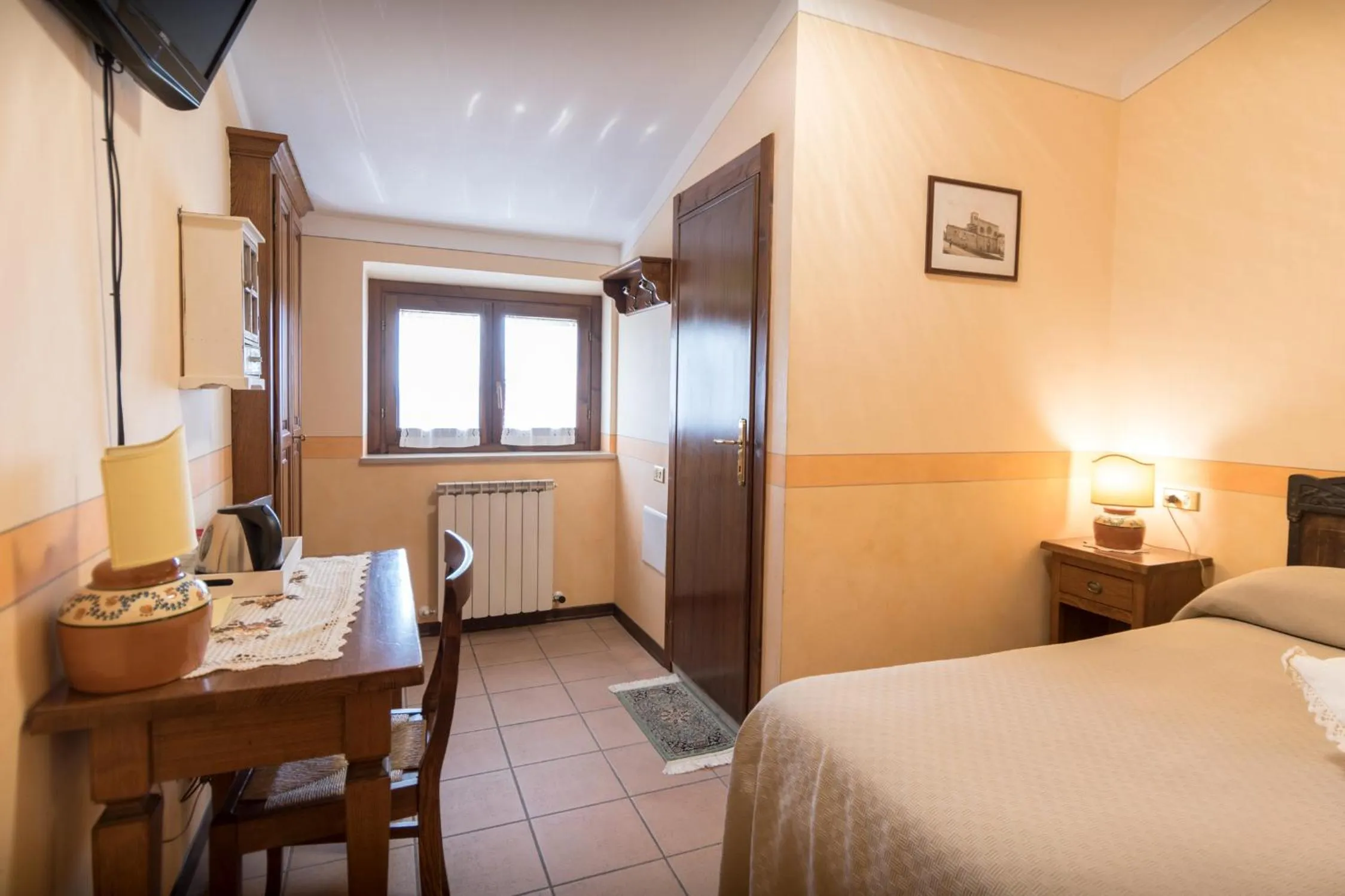 Photo of the whole room, Bed in La Piaggia