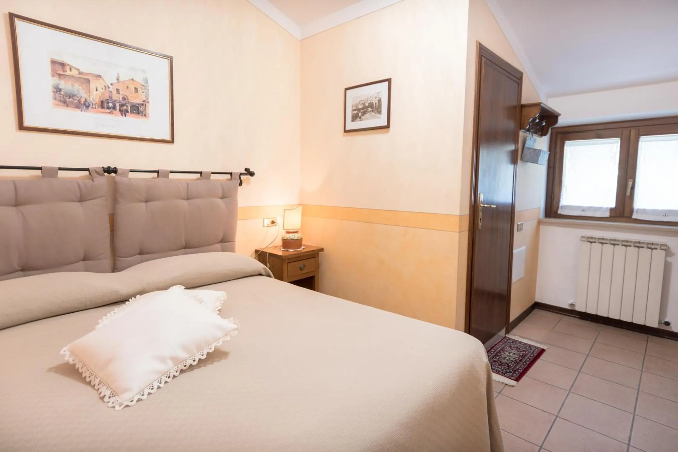 Photo of the whole room, Bed in La Piaggia