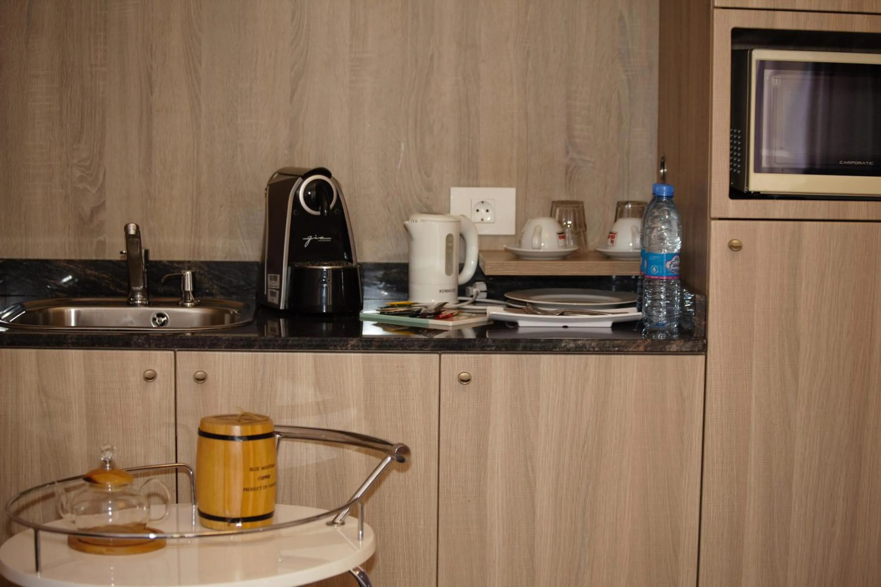 Kitchen or kitchenette in HOtello guest suites