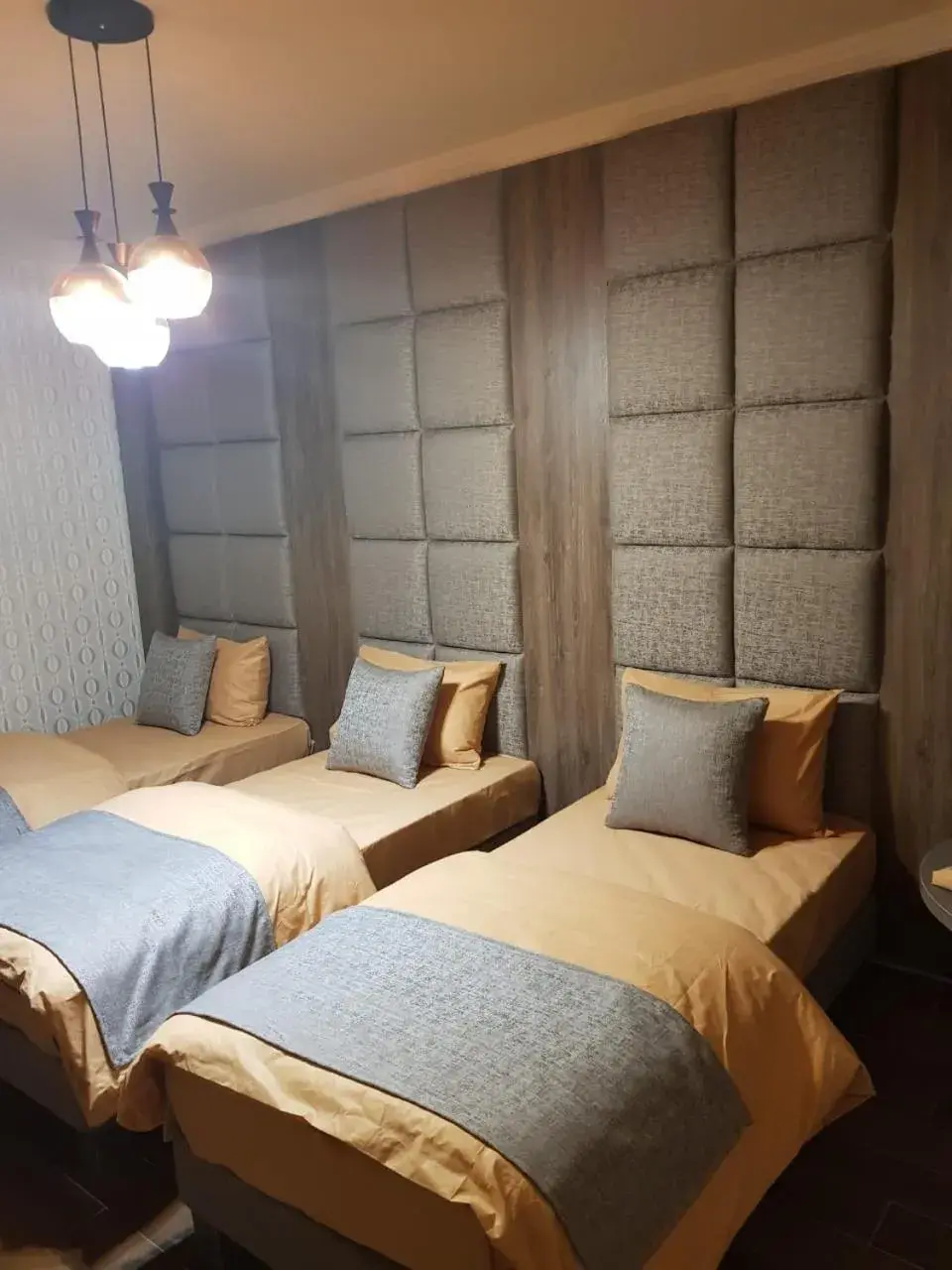 Basic Triple Room with Shared Bathroom in Four Seasons Halat Basic Triple Room with Shared Bathroom in Four Seasons Halat