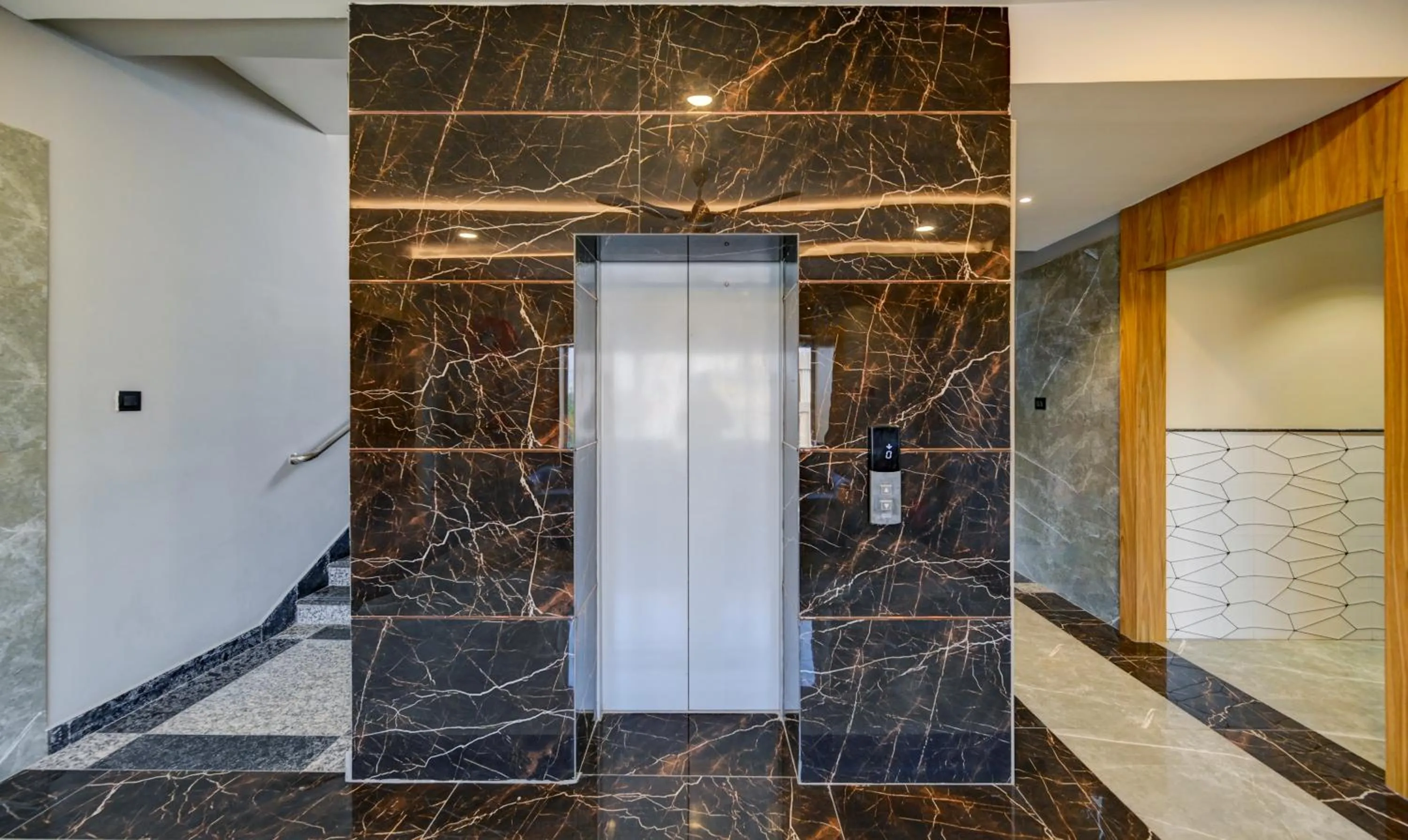 elevator in Treebo Aasma Downtown