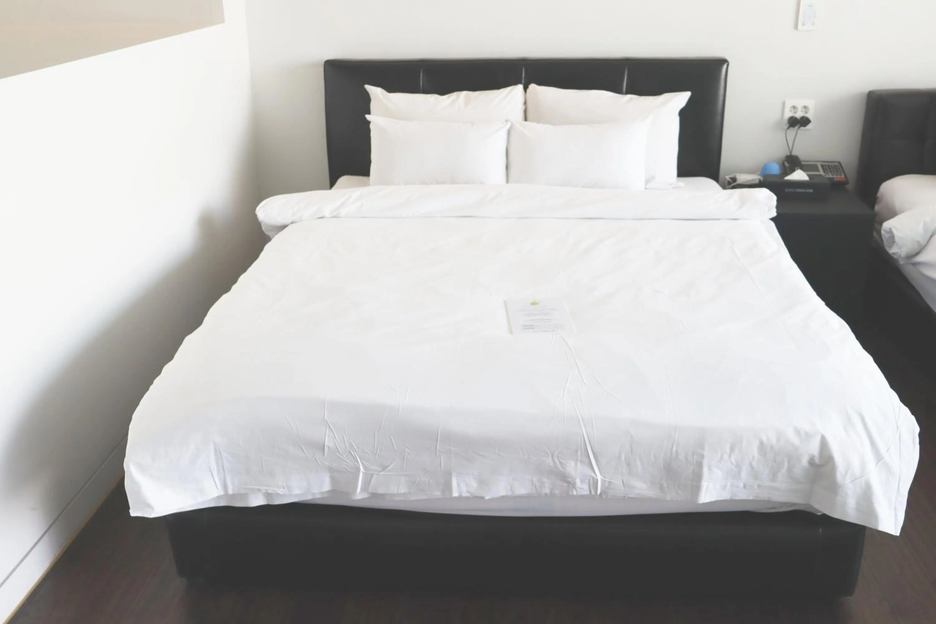 Bed in ACC Design Hotel