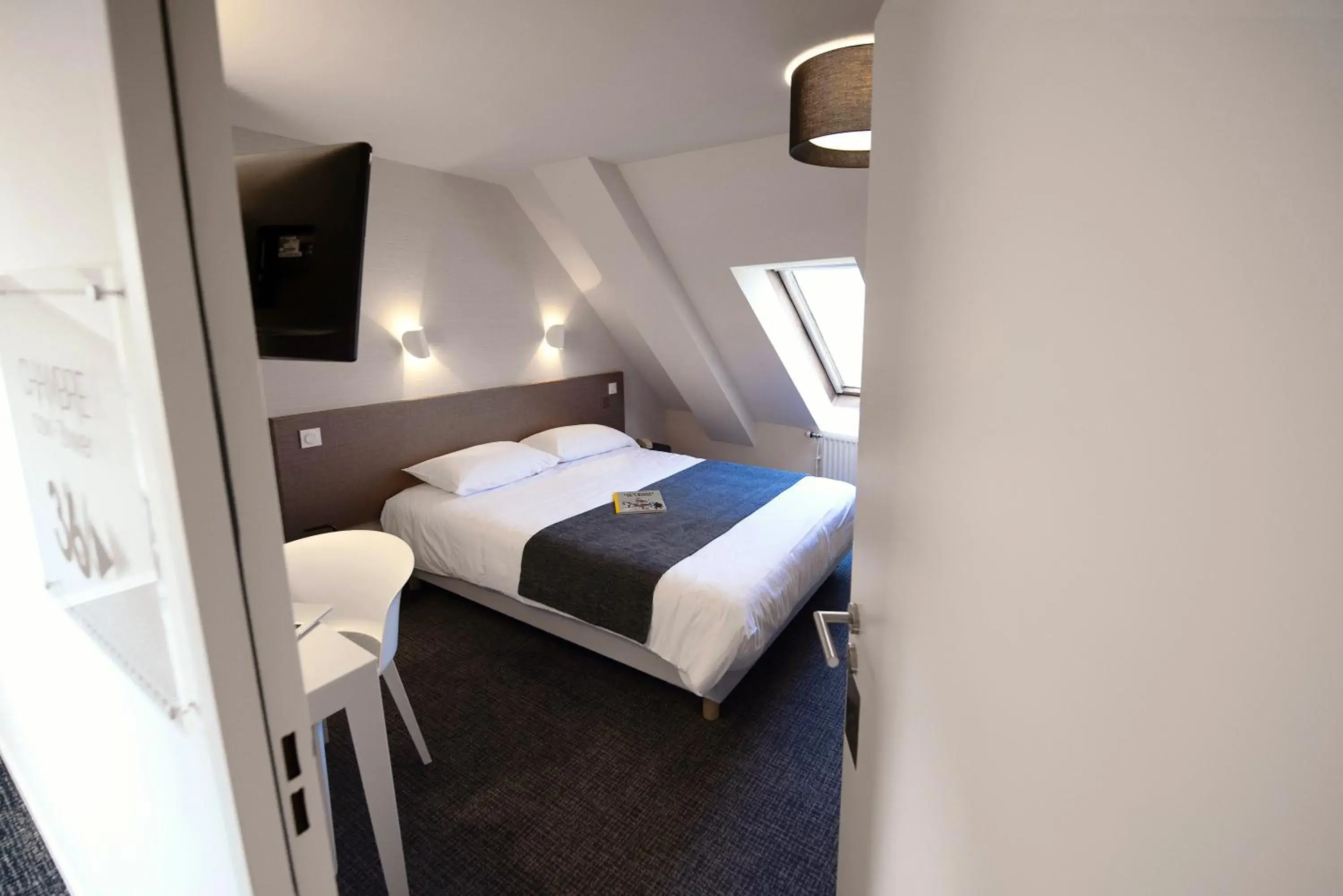 Bed in Hôtel Du Port Bed in Hôtel Du Port