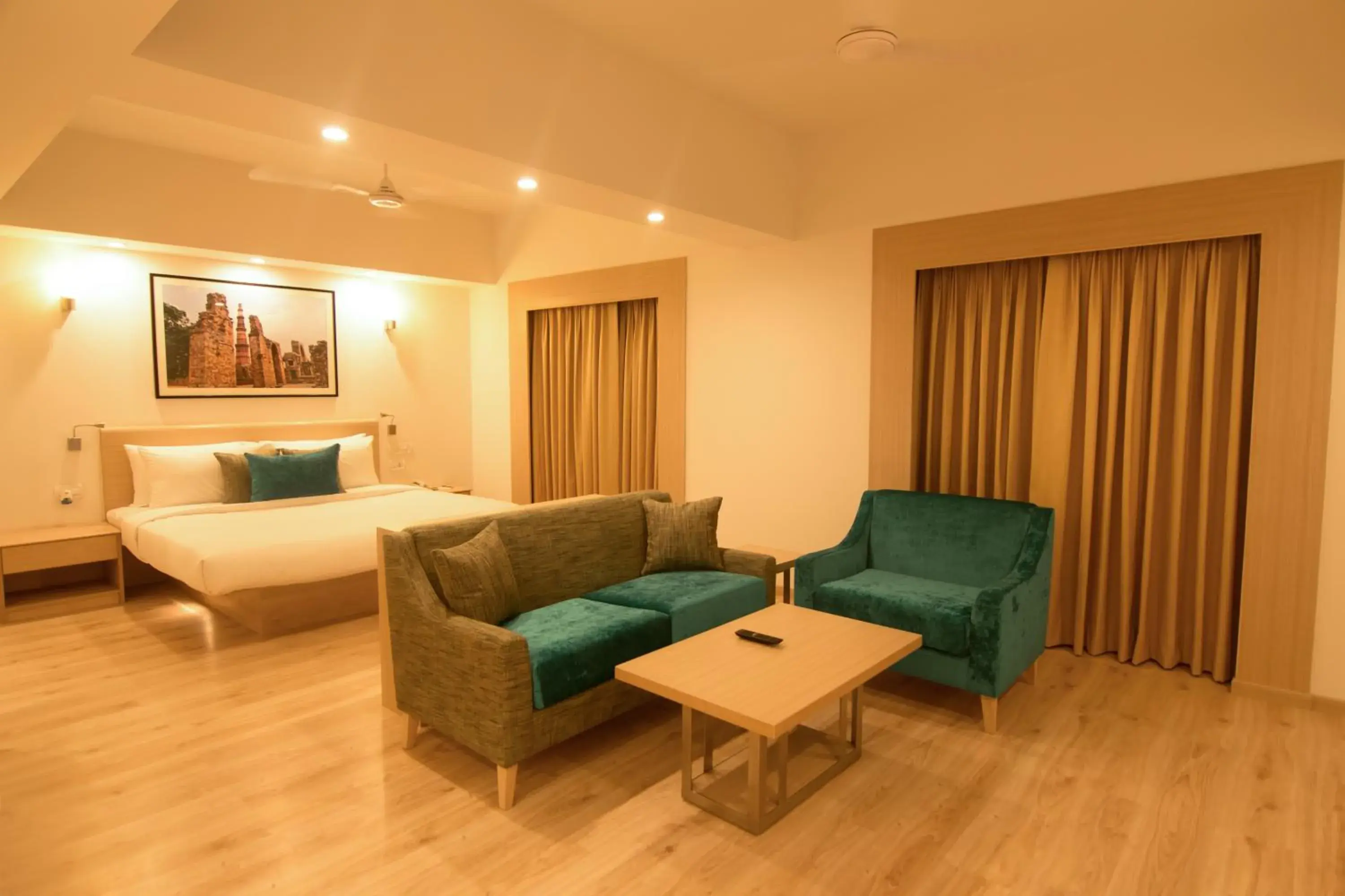 Bedroom, Seating Area in Red Fox Hotel, Sector 60, Gurugram