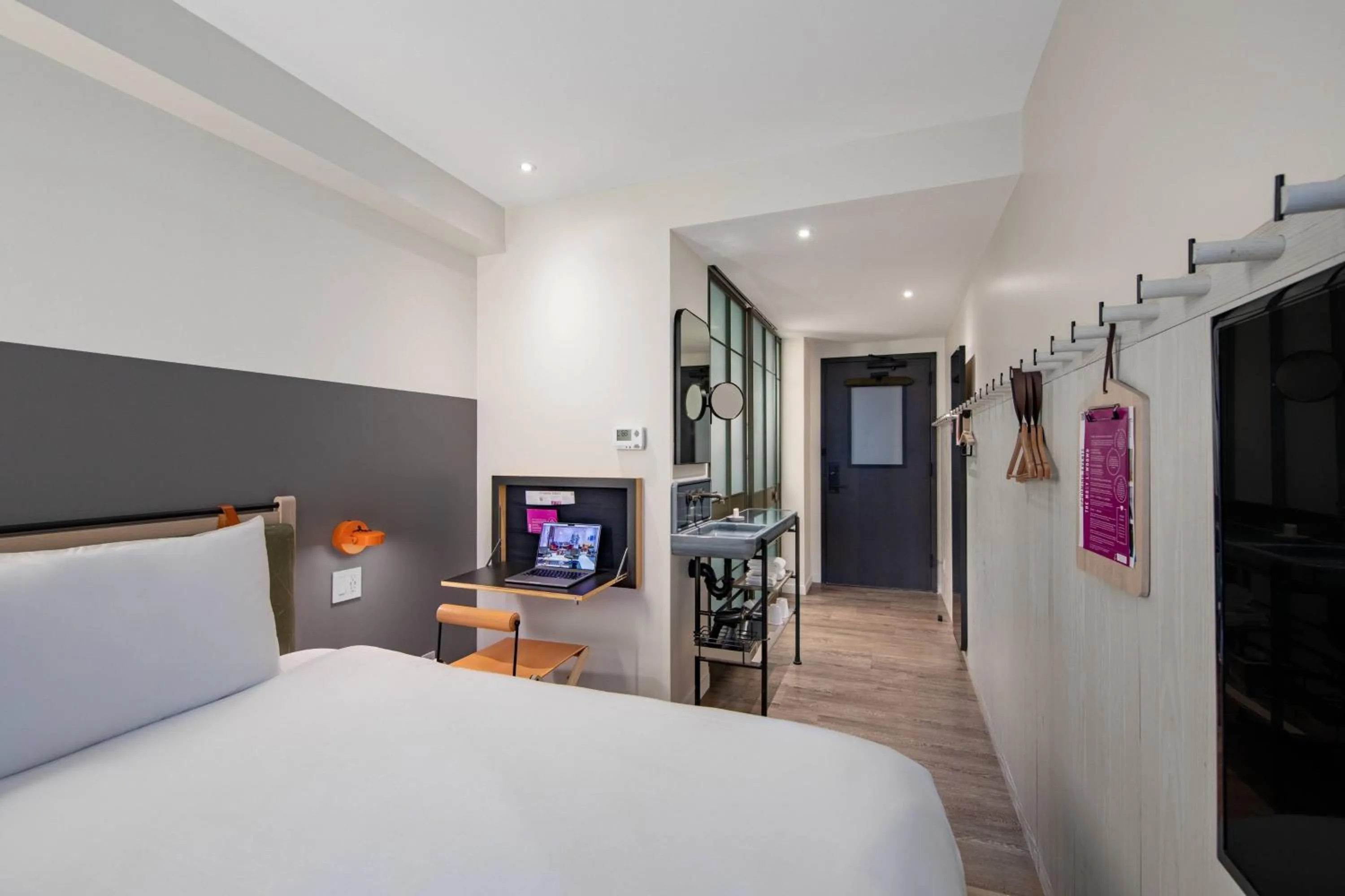 Photo of the whole room, Bed in MOXY NYC Times Square