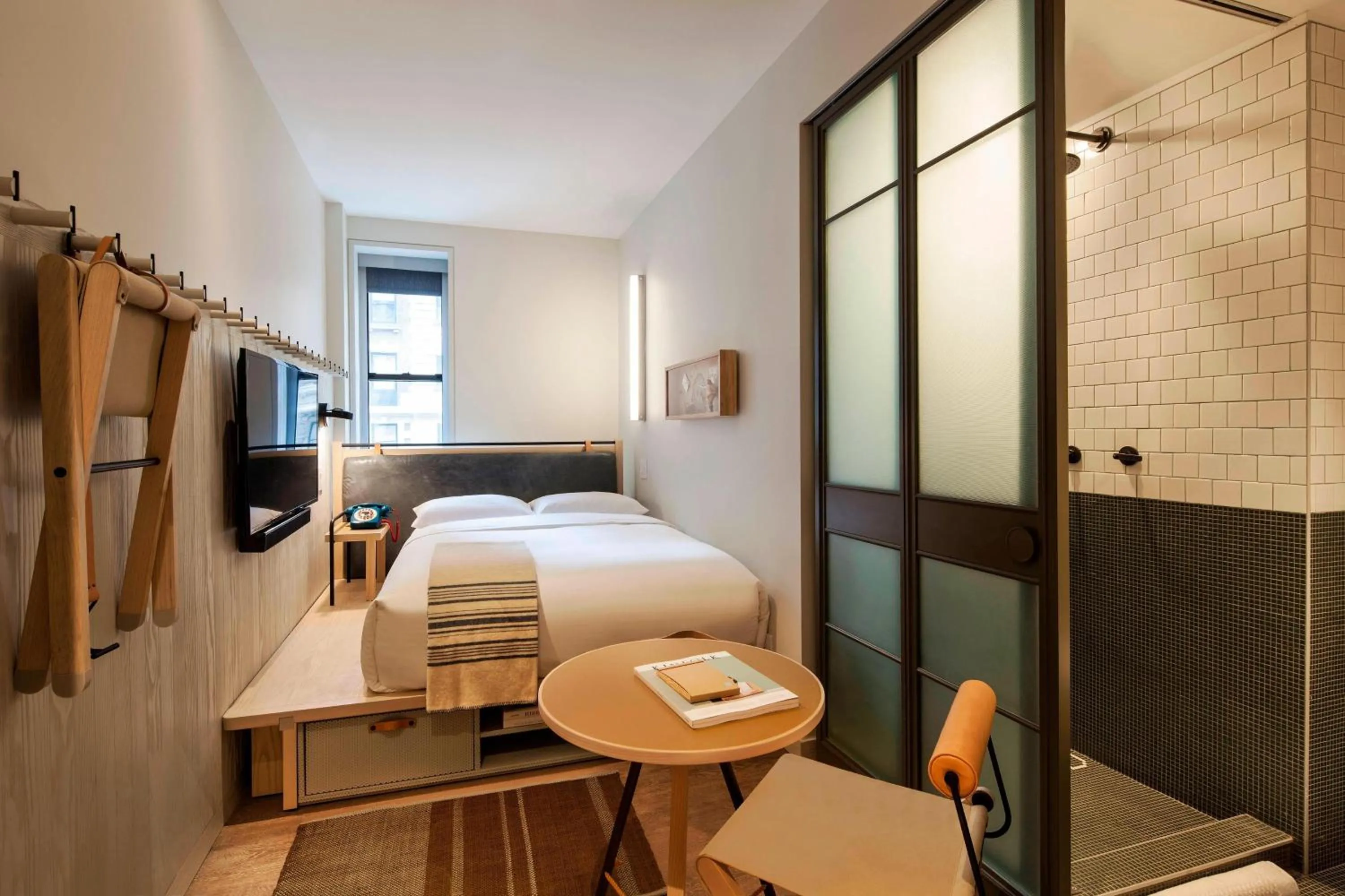 Photo of the whole room, Bed in MOXY NYC Times Square