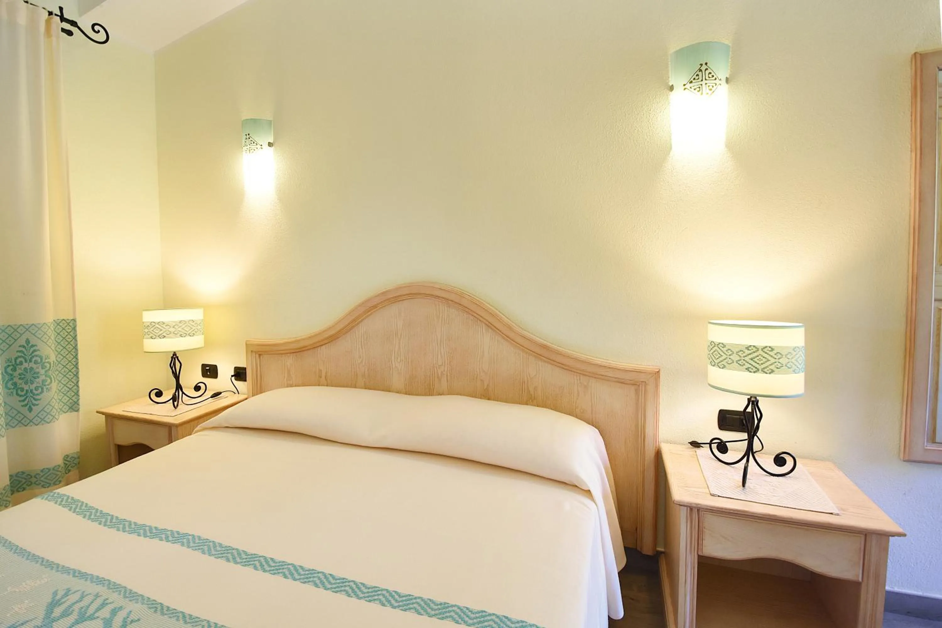 Bed in Hotel Su Giganti