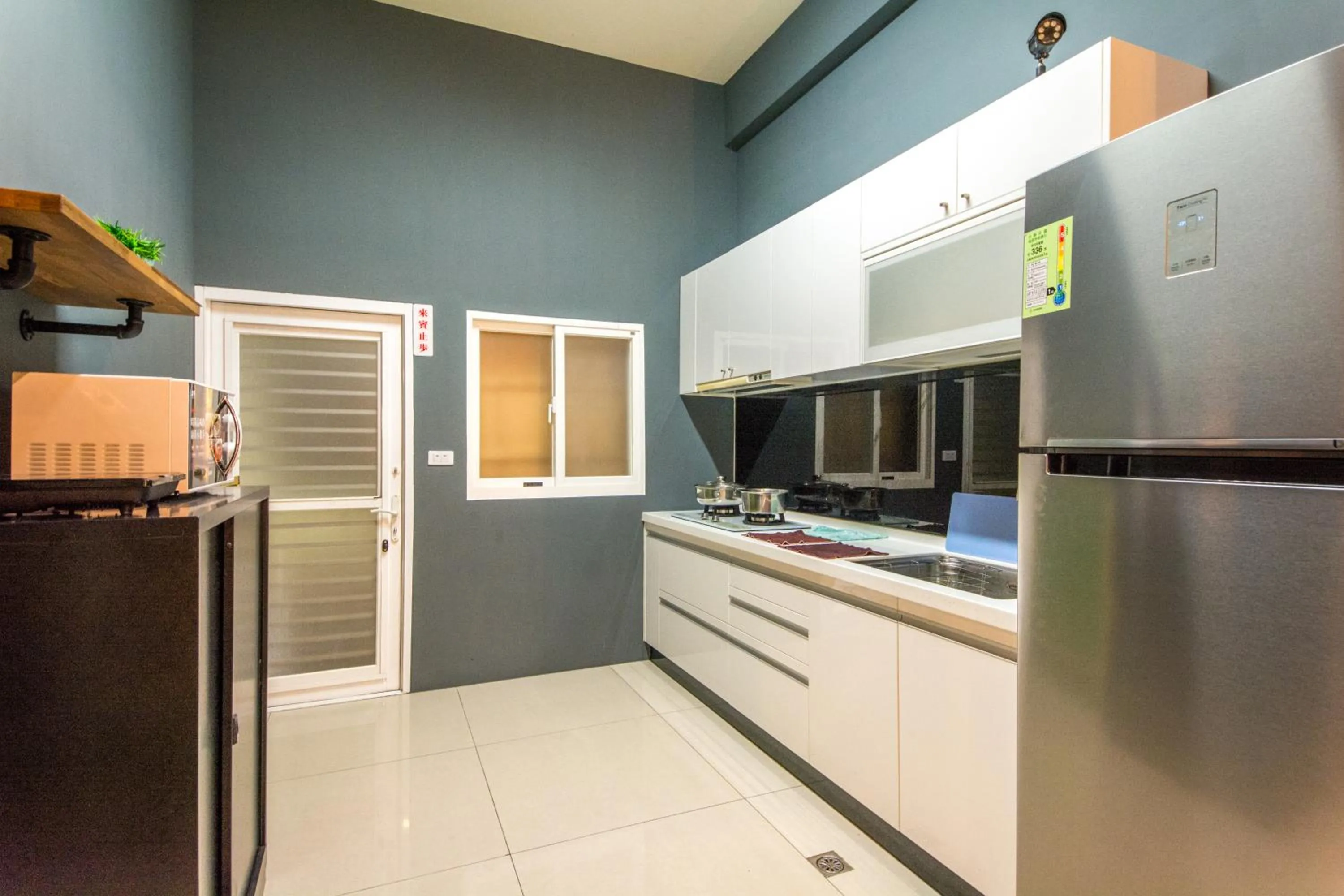 Communal kitchen in Tony's house