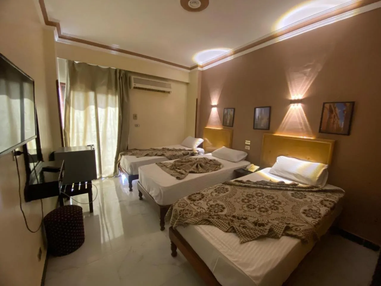 Bed in Shady Hotel Luxor