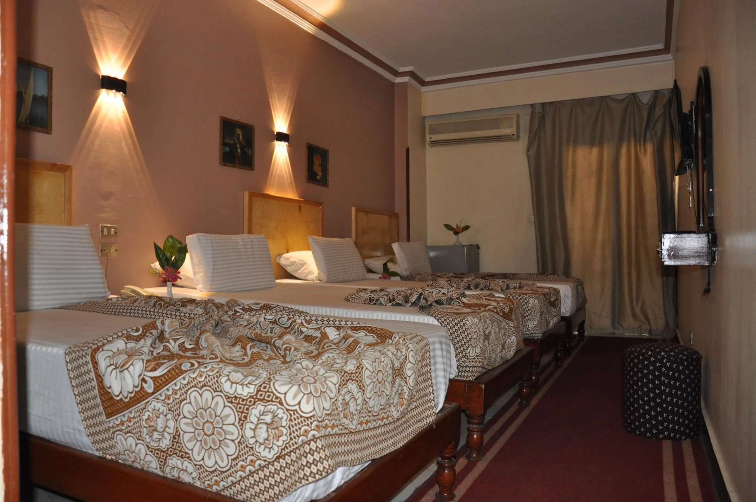 Bed in Shady Hotel Luxor