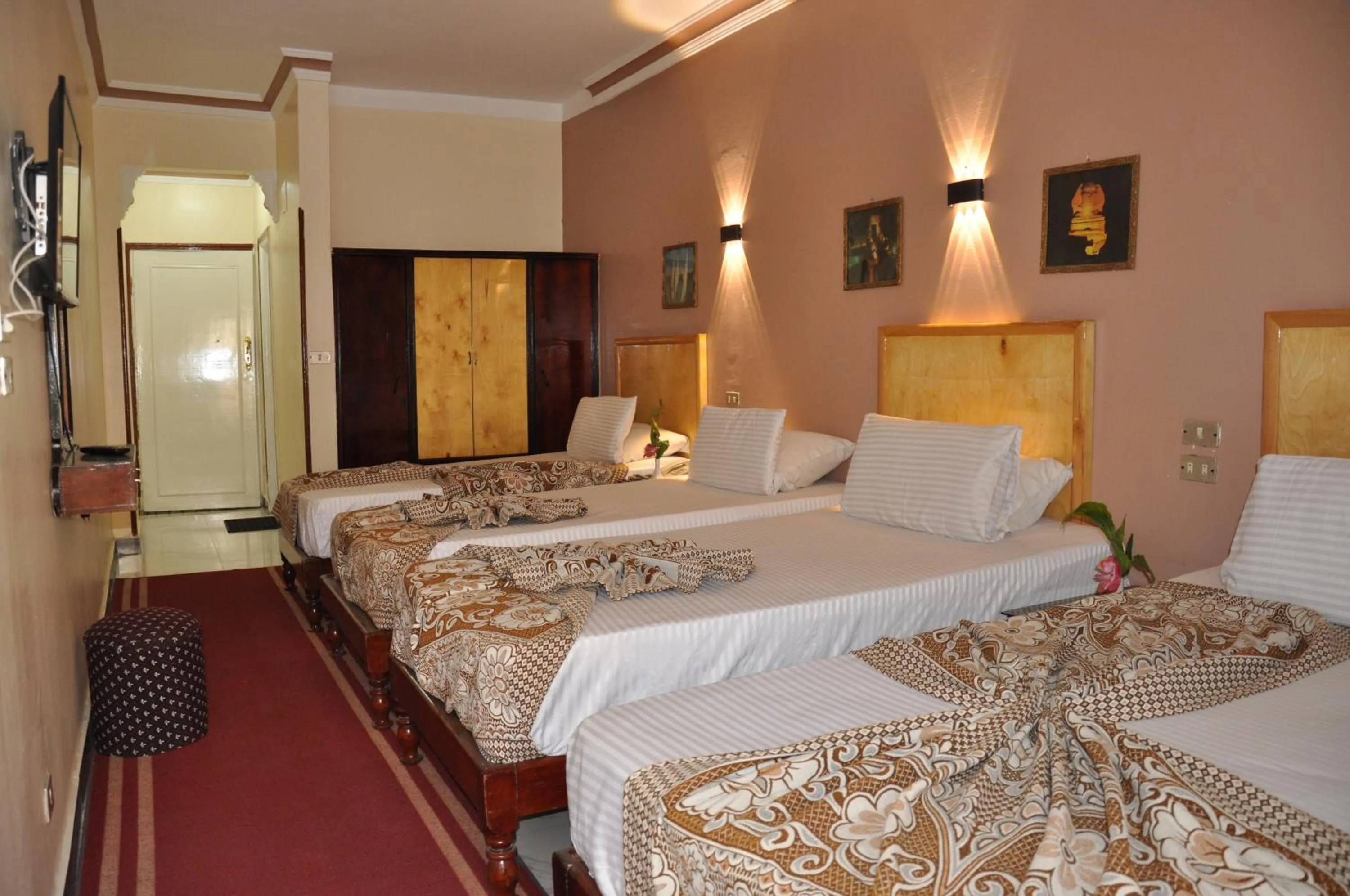 Bed in Shady Hotel Luxor