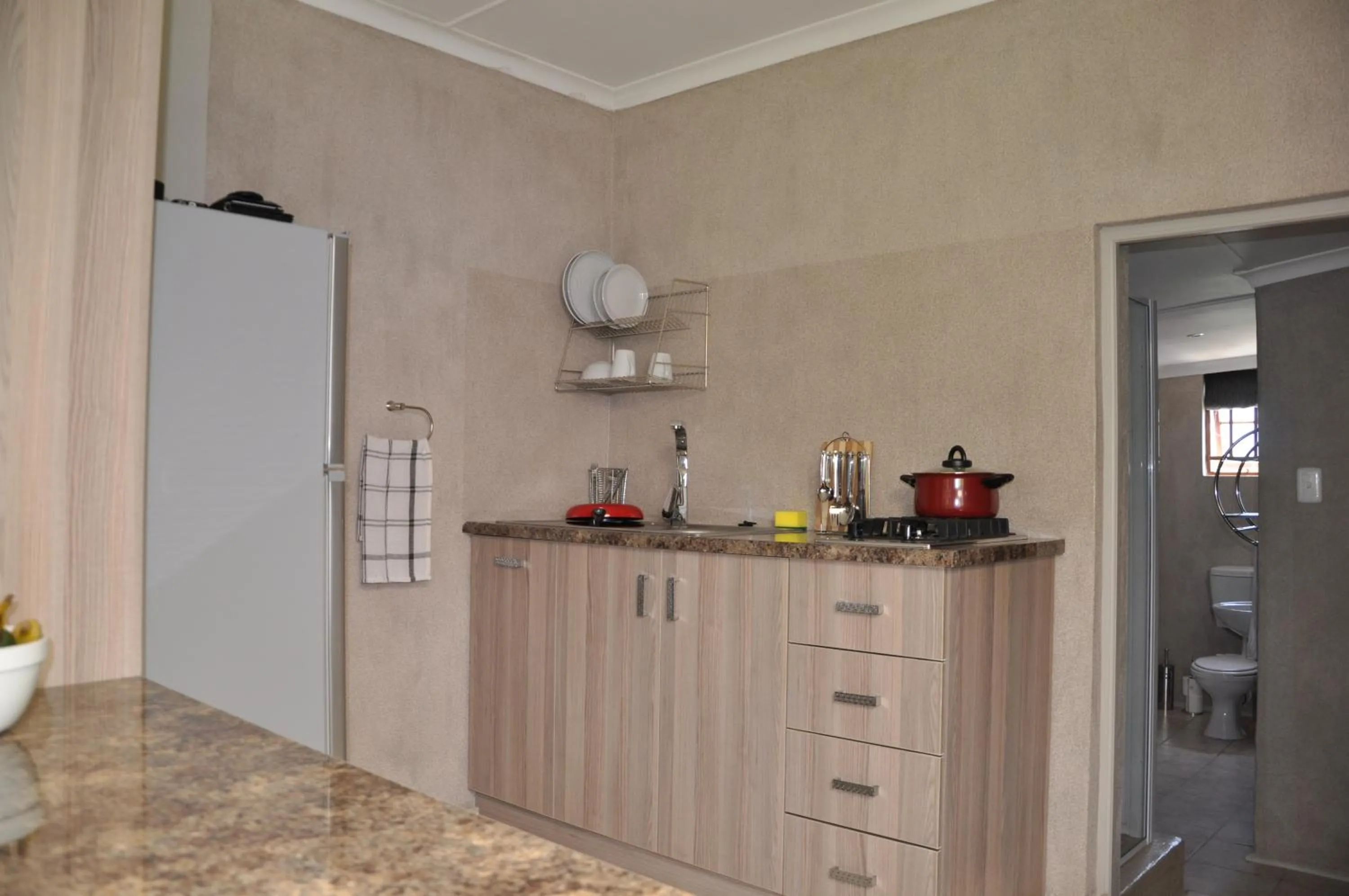 Kitchen or kitchenette in At One Lodge
