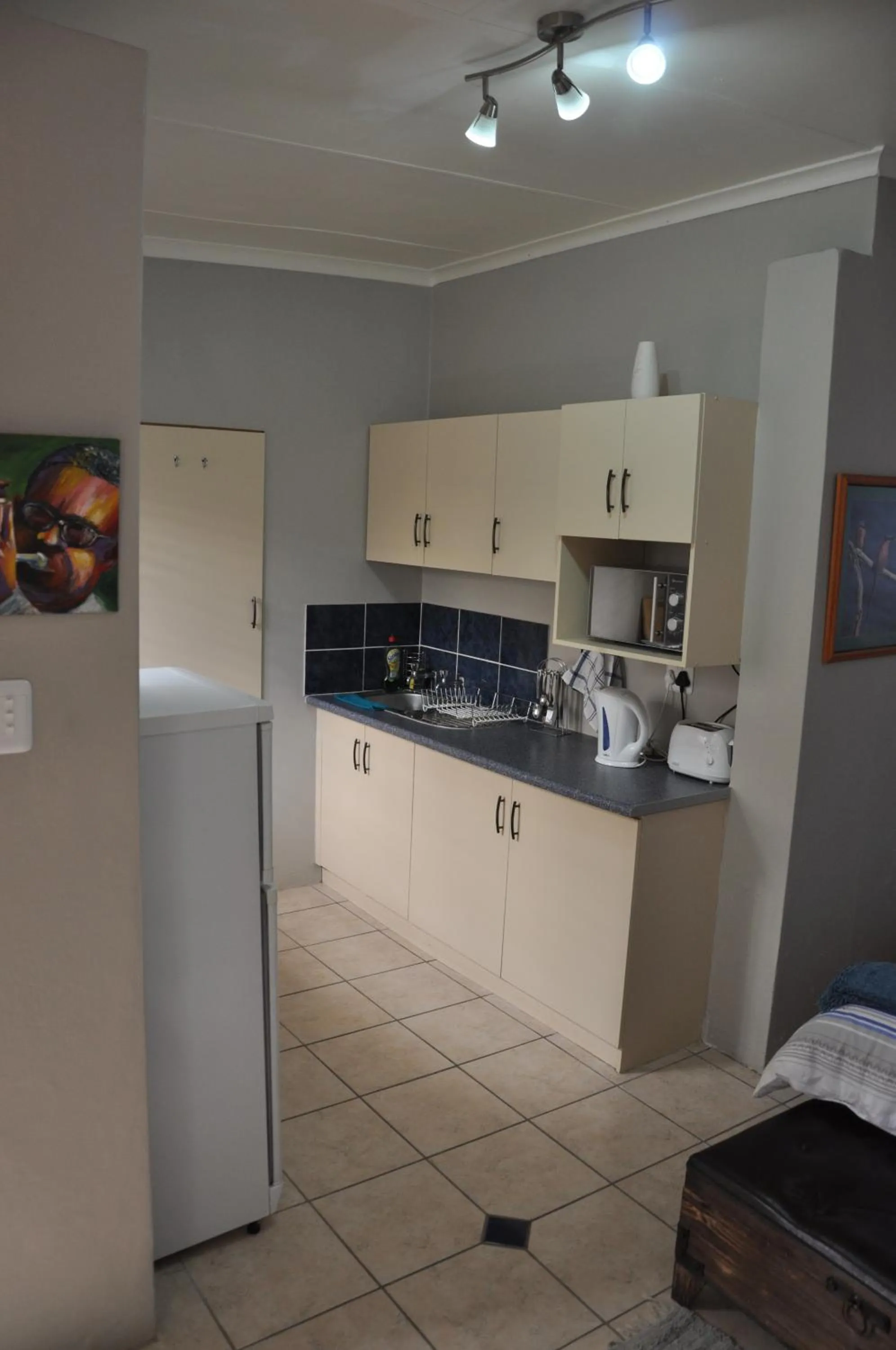 Kitchen or kitchenette in At One Lodge