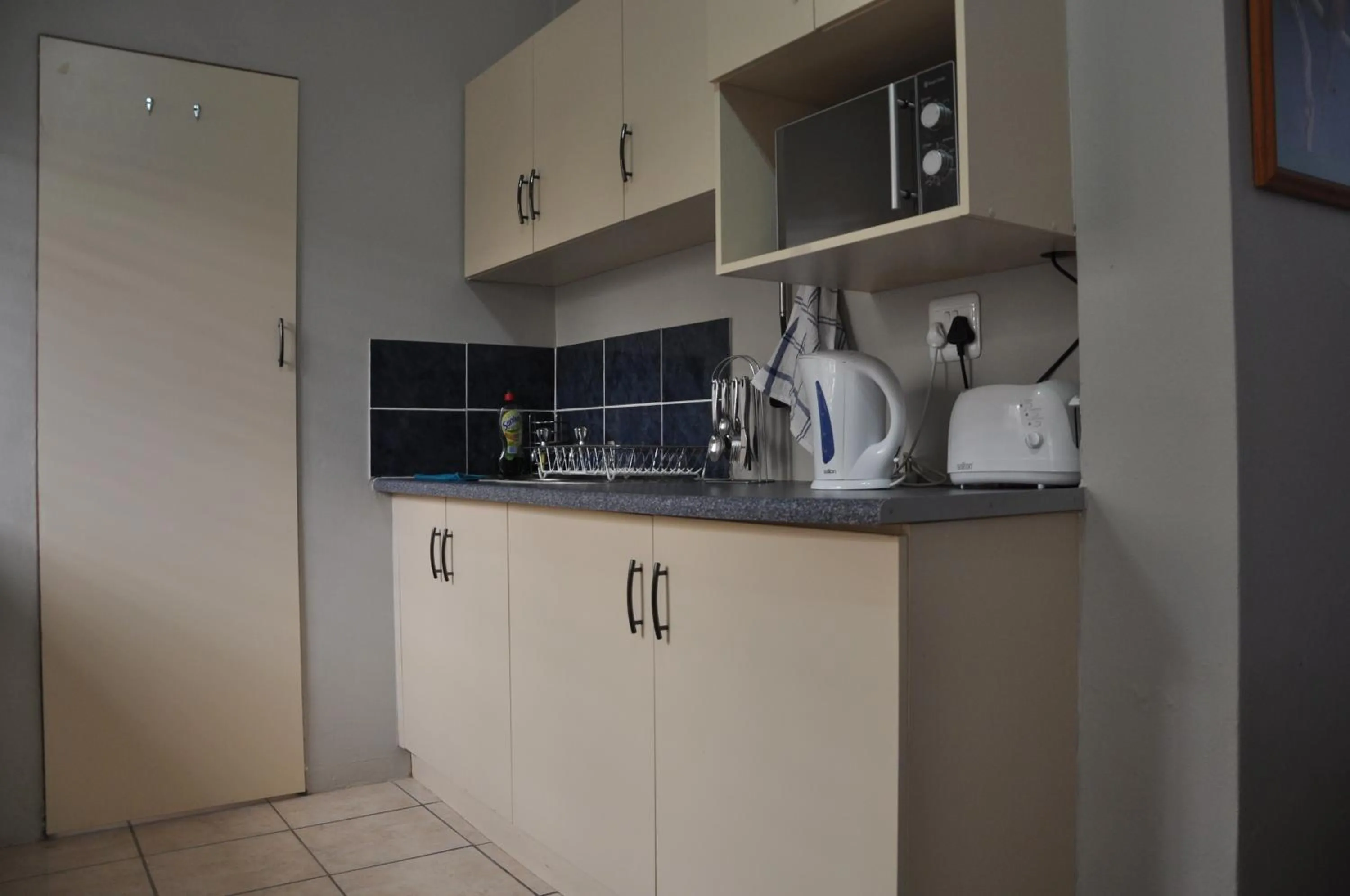 Kitchen or kitchenette in At One Lodge